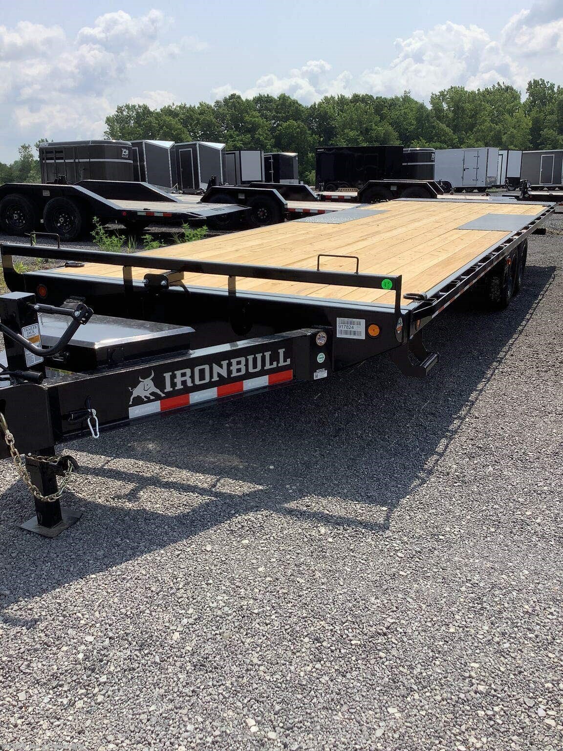 2027 TDP0228 102x28 16000 GVWR Deckover Tilt Trailer by IronBull from Joe's Trailer Mfg in Clarklake, Michigan