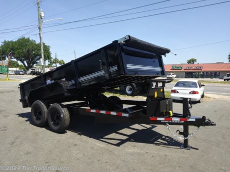 &lt;h2&gt;&lt;strong&gt;7&#39; x 14&#39; 14K Dump Trailers For Sale&lt;/strong&gt;&lt;/h2&gt;
&lt;p&gt;&lt;strong&gt;NOTE: Trailer pictures may include optional features that are not included in the base price. See available options below. &lt;/strong&gt;&lt;/p&gt;
&lt;p&gt;&lt;em&gt;The U-Dump Pro is designed and built by the company that pioneered the dump trailer more than 30 years ago: &lt;strong&gt;&amp;ldquo;The Original.&amp;rdquo;&lt;/strong&gt; &lt;/em&gt;&lt;/p&gt;
&lt;p&gt;These 14K dump trailers are proudly built in the USA by the company that originated the dump trailer more than 40 years ago. Standard equipment includes a deep cycle marine battery, battery charger, and remote control dumping feature. U-Dump builds high performance, durable trailers for any job.&lt;/p&gt;
&lt;h2&gt;14K Dump Trailer Specifications:&lt;/h2&gt;
&lt;ul&gt;
&lt;li&gt;&lt;em&gt;7&#39; X 14&#39;&lt;/em&gt;&lt;/li&gt;
&lt;li&gt;&lt;em&gt;14K GVWR&lt;/em&gt;&lt;/li&gt;
&lt;li&gt;&lt;em&gt;10GA Sides&lt;/em&gt;&lt;/li&gt;
&lt;li&gt;&lt;em&gt;10GA Floor&lt;/em&gt;&lt;/li&gt;
&lt;li&gt;&lt;em&gt;Ramps&lt;/em&gt;&lt;/li&gt;
&lt;li&gt;&lt;em&gt;Full Height Stake Pockets&lt;/em&gt;&lt;/li&gt;
&lt;li&gt;&lt;em&gt;2 5/16 Adjustable Coupler&lt;/em&gt;&lt;/li&gt;
&lt;li&gt;&lt;em&gt;12K Spring Loaded Jack&lt;/em&gt;&lt;/li&gt;
&lt;li&gt;&lt;em&gt;Tarp Brackets&lt;/em&gt;&lt;/li&gt;
&lt;li&gt;&lt;em&gt;Spare Mount&lt;/em&gt;&lt;/li&gt;
&lt;li&gt;&lt;em&gt;LED lights&lt;/em&gt;&lt;/li&gt;
&lt;/ul&gt;
&lt;p&gt;&lt;strong&gt;Options:&lt;/strong&gt;&lt;/p&gt;
&lt;ul&gt;
&lt;li&gt;&lt;em&gt;Spare Tire &lt;/em&gt;&lt;/li&gt;
&lt;li&gt;&lt;em&gt;Tarp System&lt;/em&gt;&lt;/li&gt;
&lt;li&gt;&lt;em&gt;Hoist&lt;/em&gt;&lt;/li&gt;
&lt;/ul&gt;
&lt;p&gt;&lt;strong&gt;Includes 5 Year Warranty&lt;/strong&gt;&lt;/p&gt;
&lt;h3&gt;In Stock! Contact Us Now!&lt;/h3&gt;
&lt;p&gt;See more at: &lt;a href=&quot;https://thetrailersource.com&quot;&gt;https://thetrailersource.com&lt;/a&gt;&lt;/p&gt;