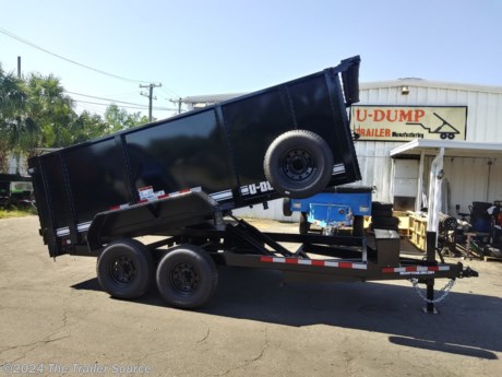 &lt;h2&gt;High Side, Low Profile 14K Dump Trailer&lt;/h2&gt;
&lt;p&gt;&lt;strong&gt;NOTE: Trailer pictures may include optional features that are not included in the base price. See available options below.&lt;/strong&gt;&lt;/p&gt;
&lt;p&gt;&lt;em&gt;U-Dump has been building the industry&#39;s finest dump trailers for more than 30 years: &lt;strong&gt;&amp;ldquo;The Original.&amp;rdquo;&lt;/strong&gt;&lt;/em&gt;&lt;/p&gt;
&lt;p&gt;This high side, low profile dump trailer is proudly built in the USA by one of the industry&#39;s oldest and most trusted manufacturers. Standard equipment includes a deep cycle marine battery, 5 amp battery charger, electric brakes on both axles, undercoating, and an enclosed lockable power box. Features also include double rear doors and remote controlled dumping on a 10&#39; cord. U-Dump Pro Series trailers are heavy duty trailers designed to work in the toughest conditions and built to last.&lt;/p&gt;
&lt;h2&gt;Pro Series 14K Dump Trailer Specifications:&lt;/h2&gt;
&lt;ul&gt;
&lt;li&gt;&lt;em&gt;83&quot; X 14&#39;&lt;/em&gt;&lt;/li&gt;
&lt;li&gt;&lt;em&gt;14K GVWR&lt;/em&gt;&lt;/li&gt;
&lt;li&gt;&lt;em&gt;48&quot; high sides&lt;/em&gt;&lt;/li&gt;
&lt;li&gt;&lt;em&gt;10GA Floor&lt;/em&gt;&lt;/li&gt;
&lt;li&gt;&lt;em&gt;10GA Sides&lt;/em&gt;&lt;/li&gt;
&lt;li&gt;&lt;em&gt;LED Lights&lt;/em&gt;&lt;/li&gt;
&lt;li&gt;&lt;em&gt;Full Height 3/16&quot; Stake Pockets&lt;/em&gt;&lt;/li&gt;
&lt;li&gt;&lt;em&gt;12k Spring Loaded Jack&lt;/em&gt;&lt;/li&gt;
&lt;li&gt;&lt;em&gt;Tarp Roller&lt;/em&gt;&lt;/li&gt;
&lt;li&gt;&lt;em&gt;2 5/16 Adjustable Coupler&lt;/em&gt;&lt;/li&gt;
&lt;li&gt;&lt;em&gt;Battery&lt;/em&gt;&lt;/li&gt;
&lt;li&gt;&lt;em&gt;Battery Charger&lt;/em&gt;&lt;/li&gt;
&lt;li&gt;&lt;em&gt;Spare Mount&lt;/em&gt;&lt;/li&gt;
&lt;/ul&gt;
&lt;p&gt;&lt;strong&gt;Options:&lt;/strong&gt;&lt;/p&gt;
&lt;ul&gt;
&lt;li&gt;&lt;em&gt;Color&lt;/em&gt;&lt;/li&gt;
&lt;li&gt;&lt;em&gt;Spare Tire&lt;/em&gt;&lt;/li&gt;
&lt;li&gt;&lt;em&gt;Hoist&lt;/em&gt;&lt;/li&gt;
&lt;/ul&gt;
&lt;p&gt;&lt;strong&gt;Includes 5 Year Warranty&lt;/strong&gt;&lt;/p&gt;
&lt;h3&gt;In Stock! Contact Us Now!&lt;/h3&gt;
&lt;p&gt;See more at: &lt;a href=&quot;https://thetrailersource.com&quot;&gt;https://thetrailersource.com&lt;/a&gt;&lt;/p&gt;
