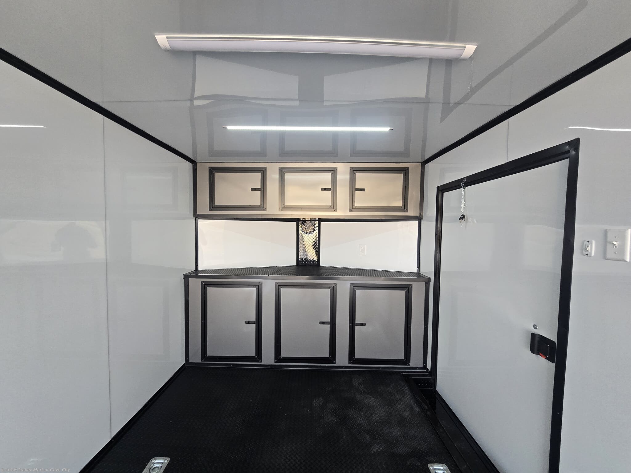 2026 8.5'x24'TA3 (Blackout Package) Enclosed Car Hauler by Steel Pines Cargo from Trailer Mart of Cave City in Cave City, Kentucky