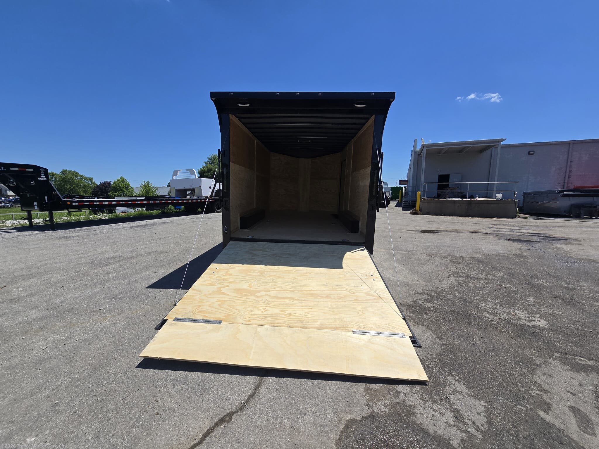 2026 8.5'x16'TA3 (Blackout Package) Enclosed Car Hauler by Steel Pines Cargo from Trailer Mart of Cave City in Cave City, Kentucky