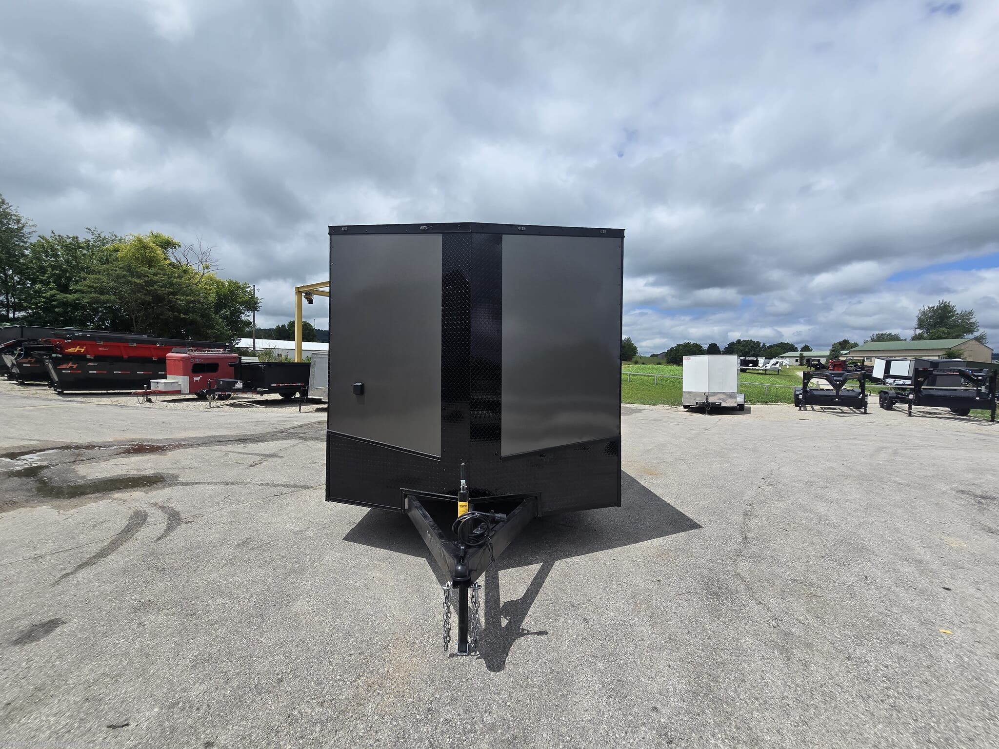 2026 8.5'x16'TA3 (Blackout Package) Enclosed Car Hauler by Steel Pines Cargo from Trailer Mart of Cave City in Cave City, Kentucky