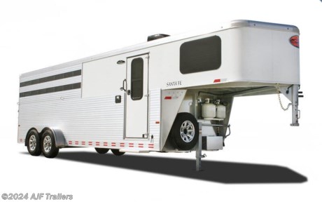 &lt;p class=&quot;MsoNormal&quot;&gt;&amp;nbsp;&lt;/p&gt;
&lt;p class=&quot;MsoNormal&quot;&gt;&lt;span style=&quot;font-family: Arial, Helvetica, sans-serif; font-size: 11px;&quot;&gt;The Santa Fe is the ultimate combination of Sundowner&amp;rsquo;s most popular features and affordability. This all aluminum trailer is lightweight for towing ease and fuel economy. Available in 2 to 10 horse models, the Santa Fe offers a bathroom with a shower and toilet, small kitchen, boot box or sofa and air conditioner. Numerous other options are available inside and out to make your new trailer uniquely yours!&lt;/span&gt;&lt;/p&gt;
&lt;table class=&quot;specs&quot; style=&quot;width: 330px; margin: 0px; font-family: Arial, Helvetica, sans-serif; font-size: 11px; background-color: #e1ecf2;&quot; border=&quot;0&quot; width=&quot;360&quot; cellspacing=&quot;0&quot; cellpadding=&quot;0&quot;&gt;
&lt;tbody&gt;
&lt;tr&gt;
&lt;td style=&quot;padding: 3px 0px; border-bottom: 1px solid #a09772;&quot; colspan=&quot;2&quot;&gt;
&lt;h3 style=&quot;margin: 0px; padding: 0px; border: 0px;&quot;&gt;Standard Features&lt;/h3&gt;
&lt;/td&gt;
&lt;/tr&gt;
&lt;tr&gt;
&lt;td style=&quot;padding: 3px 0px; border-bottom: 1px solid #a09772;&quot; colspan=&quot;2&quot;&gt;15,000 BTU air conditioner with heat strip&lt;/td&gt;
&lt;/tr&gt;
&lt;tr&gt;
&lt;td style=&quot;padding: 3px 0px; border-bottom: 1px solid #a09772;&quot; colspan=&quot;2&quot;&gt;Wallboard walls and ceiling&lt;/td&gt;
&lt;/tr&gt;
&lt;tr&gt;
&lt;td style=&quot;padding: 3px 0px; border-bottom: 1px solid #a09772;&quot; colspan=&quot;2&quot;&gt;Wood window frames&lt;/td&gt;
&lt;/tr&gt;
&lt;tr&gt;
&lt;td style=&quot;padding: 3px 0px; border-bottom: 1px solid #a09772;&quot; colspan=&quot;2&quot;&gt;Raised panel cabinet doors&lt;/td&gt;
&lt;/tr&gt;
&lt;tr&gt;
&lt;td style=&quot;padding: 3px 0px; border-bottom: 1px solid #a09772;&quot; colspan=&quot;2&quot;&gt;Overhead cabinets above kitchen area&lt;/td&gt;
&lt;/tr&gt;
&lt;tr&gt;
&lt;td style=&quot;padding: 3px 0px; border-bottom: 1px solid #a09772;&quot; colspan=&quot;2&quot;&gt;3 cu. ft. gas/electric refrigerator&lt;/td&gt;
&lt;/tr&gt;
&lt;tr&gt;
&lt;td style=&quot;padding: 3px 0px; border-bottom: 1px solid #a09772;&quot; colspan=&quot;2&quot;&gt;Microwave&lt;/td&gt;
&lt;/tr&gt;
&lt;tr&gt;
&lt;td style=&quot;padding: 3px 0px; border-bottom: 1px solid #a09772;&quot; colspan=&quot;2&quot;&gt;Formica counter tops&lt;/td&gt;
&lt;/tr&gt;
&lt;tr&gt;
&lt;td style=&quot;padding: 3px 0px; border-bottom: 1px solid #a09772;&quot; colspan=&quot;2&quot;&gt;Single bowl kitchen sink&lt;/td&gt;
&lt;/tr&gt;
&lt;tr&gt;
&lt;td style=&quot;padding: 3px 0px; border-bottom: 1px solid #a09772;&quot; colspan=&quot;2&quot;&gt;Crank up TV Antenna&lt;/td&gt;
&lt;/tr&gt;
&lt;tr&gt;
&lt;td style=&quot;padding: 3px 0px; border-bottom: 1px solid #a09772;&quot; colspan=&quot;2&quot;&gt;AM/FM radio, CD player with interior speakers&lt;/td&gt;
&lt;/tr&gt;
&lt;tr&gt;
&lt;td style=&quot;padding: 3px 0px; border-bottom: 1px solid #a09772;&quot; colspan=&quot;2&quot;&gt;Day/night shades&lt;/td&gt;
&lt;/tr&gt;
&lt;tr&gt;
&lt;td style=&quot;padding: 3px 0px; border-bottom: 1px solid #a09772;&quot; colspan=&quot;2&quot;&gt;Choice of vinyl flooring with carpeted bedroom&lt;/td&gt;
&lt;/tr&gt;
&lt;tr&gt;
&lt;td style=&quot;padding: 3px 0px; border-bottom: 1px solid #a09772;&quot; colspan=&quot;2&quot;&gt;Mattress&lt;/td&gt;
&lt;/tr&gt;
&lt;tr&gt;
&lt;td style=&quot;padding: 3px 0px; border-bottom: 1px solid #a09772;&quot; colspan=&quot;2&quot;&gt;Quilt&lt;/td&gt;
&lt;/tr&gt;
&lt;tr&gt;
&lt;td style=&quot;padding: 3px 0px; border-bottom: 1px solid #a09772;&quot; colspan=&quot;2&quot;&gt;2 Night stands (8&#39; only)&lt;/td&gt;
&lt;/tr&gt;
&lt;tr&gt;
&lt;td style=&quot;padding: 3px 0px; border-bottom: 1px solid #a09772;&quot; colspan=&quot;2&quot;&gt;TV Stand&lt;/td&gt;
&lt;/tr&gt;
&lt;tr&gt;
&lt;td style=&quot;padding: 3px 0px; border-bottom: 1px solid #a09772;&quot; colspan=&quot;2&quot;&gt;Wardrobe and linen closet&lt;/td&gt;
&lt;/tr&gt;
&lt;tr&gt;
&lt;td style=&quot;padding: 3px 0px; border-bottom: 1px solid #a09772;&quot; colspan=&quot;2&quot;&gt;Recessed LED lights&lt;/td&gt;
&lt;/tr&gt;
&lt;tr&gt;
&lt;td style=&quot;padding: 3px 0px; border-bottom: 1px solid #a09772;&quot; colspan=&quot;2&quot;&gt;Retractable shower door&lt;/td&gt;
&lt;/tr&gt;
&lt;tr&gt;
&lt;td style=&quot;padding: 3px 0px; border-bottom: 1px solid #a09772;&quot; colspan=&quot;2&quot;&gt;Towel rack, ring and paper holder&lt;/td&gt;
&lt;/tr&gt;
&lt;tr&gt;
&lt;td style=&quot;padding: 3px 0px; border-bottom: 1px solid #a09772;&quot; colspan=&quot;2&quot;&gt;Toilet&lt;/td&gt;
&lt;/tr&gt;
&lt;tr&gt;
&lt;td style=&quot;padding: 3px 0px; border-bottom: 1px solid #a09772;&quot; colspan=&quot;2&quot;&gt;Shower&lt;/td&gt;
&lt;/tr&gt;
&lt;tr&gt;
&lt;td style=&quot;padding: 3px 0px; border-bottom: 1px solid #a09772;&quot; colspan=&quot;2&quot;&gt;Power roof vent in bathroom&lt;/td&gt;
&lt;/tr&gt;
&lt;tr&gt;
&lt;td style=&quot;padding: 3px 0px; border-bottom: 1px solid #a09772;&quot; colspan=&quot;2&quot;&gt;Metal grab handle&lt;/td&gt;
&lt;/tr&gt;
&lt;tr&gt;
&lt;td style=&quot;padding: 3px 0px; border-bottom: 1px solid #a09772;&quot; colspan=&quot;2&quot;&gt;Fresh water tank&lt;/td&gt;
&lt;/tr&gt;
&lt;tr&gt;
&lt;td style=&quot;padding: 3px 0px; border-bottom: 1px solid #a09772;&quot; colspan=&quot;2&quot;&gt;12 volt demand water pump&lt;/td&gt;
&lt;/tr&gt;
&lt;tr&gt;
&lt;td style=&quot;padding: 3px 0px; border-bottom: 1px solid #a09772;&quot; colspan=&quot;2&quot;&gt;City water hook up&lt;/td&gt;
&lt;/tr&gt;
&lt;tr&gt;
&lt;td style=&quot;padding: 3px 0px; border-bottom: 1px solid #a09772;&quot; colspan=&quot;2&quot;&gt;31 gallon black water tank&lt;/td&gt;
&lt;/tr&gt;
&lt;tr&gt;
&lt;td style=&quot;padding: 3px 0px; border-bottom: 1px solid #a09772;&quot; colspan=&quot;2&quot;&gt;31 gallon gray water tank&lt;/td&gt;
&lt;/tr&gt;
&lt;tr&gt;
&lt;td style=&quot;padding: 3px 0px; border-bottom: 1px solid #a09772;&quot; colspan=&quot;2&quot;&gt;Sewer dump hose and storage compartment&lt;/td&gt;
&lt;/tr&gt;
&lt;tr&gt;
&lt;td style=&quot;padding: 3px 0px; border-bottom: 1px solid #a09772;&quot; colspan=&quot;2&quot;&gt;2, 20lb. propane tanks with automatic change over valve&lt;/td&gt;
&lt;/tr&gt;
&lt;tr&gt;
&lt;td style=&quot;padding: 3px 0px; border-bottom: 1px solid #a09772;&quot; colspan=&quot;2&quot;&gt;6 gallon LP electric gas water heater, automatic recovery&lt;/td&gt;
&lt;/tr&gt;
&lt;tr&gt;
&lt;td style=&quot;padding: 3px 0px; border-bottom: 1px solid #a09772;&quot; colspan=&quot;2&quot;&gt;Water drains and water heater bypass for easy winterizing&lt;/td&gt;
&lt;/tr&gt;
&lt;tr&gt;
&lt;td style=&quot;padding: 3px 0px; border-bottom: 1px solid #a09772;&quot; colspan=&quot;2&quot;&gt;Consumer protection seals&lt;/td&gt;
&lt;/tr&gt;
&lt;tr&gt;
&lt;td style=&quot;padding: 3px 0px; border-bottom: 1px solid #a09772;&quot; colspan=&quot;2&quot;&gt;Code approved in all 50 states&lt;/td&gt;
&lt;/tr&gt;
&lt;tr&gt;
&lt;td style=&quot;padding: 3px 0px; border-bottom: 1px solid #a09772;&quot; colspan=&quot;2&quot;&gt;30 amp marine style 30&#39; power cord lifeline with 15 amp adapter&lt;/td&gt;
&lt;/tr&gt;
&lt;tr&gt;
&lt;td style=&quot;padding: 3px 0px; border-bottom: 1px solid #a09772;&quot; colspan=&quot;2&quot;&gt;12 volt charge line to truck&lt;/td&gt;
&lt;/tr&gt;
&lt;tr&gt;
&lt;td style=&quot;padding: 3px 0px; border-bottom: 1px solid #a09772;&quot; colspan=&quot;2&quot;&gt;12 volt battery disconnect switch&lt;/td&gt;
&lt;/tr&gt;
&lt;tr&gt;
&lt;td style=&quot;padding: 3px 0px; border-bottom: 1px solid #a09772;&quot; colspan=&quot;2&quot;&gt;One deep cycle battery&lt;/td&gt;
&lt;/tr&gt;
&lt;tr&gt;
&lt;td style=&quot;padding: 3px 0px; border-bottom: 1px solid #a09772;&quot; colspan=&quot;2&quot;&gt;120 volt kitchen and bathroom receptacles, GFI protected&lt;/td&gt;
&lt;/tr&gt;
&lt;tr&gt;
&lt;td style=&quot;padding: 3px 0px; border-bottom: 1px solid #a09772;&quot; colspan=&quot;2&quot;&gt;USB charge port in bunk and living area&lt;/td&gt;
&lt;/tr&gt;
&lt;tr&gt;
&lt;td style=&quot;padding: 3px 0px; border-bottom: 1px solid #a09772;&quot; colspan=&quot;2&quot;&gt;All wiring checked and rechecked at 1,080 volts&lt;/td&gt;
&lt;/tr&gt;
&lt;tr&gt;
&lt;td style=&quot;padding: 3px 0px; border-bottom: 1px solid #a09772;&quot; colspan=&quot;2&quot;&gt;LP gas leak detector&lt;/td&gt;
&lt;/tr&gt;
&lt;tr&gt;
&lt;td style=&quot;padding: 3px 0px; border-bottom: 1px solid #a09772;&quot; colspan=&quot;2&quot;&gt;Smoke alarm and fire extinguisher&lt;/td&gt;
&lt;/tr&gt;
&lt;tr&gt;
&lt;td style=&quot;padding: 3px 0px; border-bottom: 1px solid #a09772;&quot; colspan=&quot;2&quot;&gt;Emergency exit windows&lt;/td&gt;
&lt;/tr&gt;
&lt;tr&gt;
&lt;td style=&quot;padding: 3px 0px; border-bottom: 1px solid #a09772;&quot; colspan=&quot;2&quot;&gt;Tempered safety glass with positive locks and screens&lt;/td&gt;
&lt;/tr&gt;
&lt;tr&gt;
&lt;td style=&quot;padding: 3px 0px; border-bottom: 1px solid #a09772;&quot; colspan=&quot;2&quot;&gt;Full fiberglass insulation in floors, sidewalls and ceiling&lt;/td&gt;
&lt;/tr&gt;
&lt;/tbody&gt;
&lt;/table&gt;
&lt;table class=&quot;specs&quot; style=&quot;width: 330px; margin: 0px; font-family: Arial, Helvetica, sans-serif; font-size: 11px; background-color: #e1ecf2;&quot; border=&quot;0&quot; width=&quot;360&quot; cellspacing=&quot;0&quot; cellpadding=&quot;0&quot;&gt;
&lt;tbody&gt;
&lt;tr&gt;
&lt;td style=&quot;padding: 3px 0px; border-bottom: 1px solid #a09772;&quot; colspan=&quot;2&quot;&gt;
&lt;h3 style=&quot;margin: 0px; padding: 0px; border: 0px;&quot;&gt;Standard Features&lt;/h3&gt;
&lt;/td&gt;
&lt;/tr&gt;
&lt;tr&gt;
&lt;td class=&quot;listPoint&quot; style=&quot;padding: 3px 0px; border-bottom: 1px solid #a09772; font-weight: bold;&quot; width=&quot;100&quot;&gt;Coupler&lt;/td&gt;
&lt;td style=&quot;padding: 3px 0px; border-bottom: 1px solid #a09772;&quot; width=&quot;260&quot;&gt;Adjustable Gooseneck, 2 5/16&quot;&lt;/td&gt;
&lt;/tr&gt;
&lt;tr&gt;
&lt;td class=&quot;listPoint&quot; style=&quot;padding: 3px 0px; border-bottom: 1px solid #a09772; font-weight: bold;&quot; width=&quot;100&quot;&gt;Load Type&lt;/td&gt;
&lt;td style=&quot;padding: 3px 0px; border-bottom: 1px solid #a09772;&quot; width=&quot;260&quot;&gt;Slant&lt;/td&gt;
&lt;/tr&gt;
&lt;tr&gt;
&lt;td class=&quot;listPoint&quot; style=&quot;padding: 3px 0px; border-bottom: 1px solid #a09772; font-weight: bold;&quot; width=&quot;100&quot;&gt;Number of Horses&lt;/td&gt;
&lt;td style=&quot;padding: 3px 0px; border-bottom: 1px solid #a09772;&quot; width=&quot;260&quot;&gt;2 - 10 horse&lt;/td&gt;
&lt;/tr&gt;
&lt;tr&gt;
&lt;td class=&quot;listPoint&quot; style=&quot;padding: 3px 0px; border-bottom: 1px solid #a09772; font-weight: bold;&quot; width=&quot;100&quot;&gt;Trailer Width&lt;/td&gt;
&lt;td style=&quot;padding: 3px 0px; border-bottom: 1px solid #a09772;&quot; width=&quot;260&quot;&gt;6&#39; 9&quot; wide&lt;/td&gt;
&lt;/tr&gt;
&lt;tr&gt;
&lt;td class=&quot;listPoint&quot; style=&quot;padding: 3px 0px; border-bottom: 1px solid #a09772; font-weight: bold;&quot; width=&quot;100&quot;&gt;Inside Height&lt;/td&gt;
&lt;td style=&quot;padding: 3px 0px; border-bottom: 1px solid #a09772;&quot; width=&quot;260&quot;&gt;7&#39;&lt;/td&gt;
&lt;/tr&gt;
&lt;tr&gt;
&lt;td class=&quot;listPoint&quot; style=&quot;padding: 3px 0px; border-bottom: 1px solid #a09772; font-weight: bold;&quot; width=&quot;100&quot;&gt;Stall Width&lt;/td&gt;
&lt;td style=&quot;padding: 3px 0px; border-bottom: 1px solid #a09772;&quot; width=&quot;260&quot;&gt;39&quot;&lt;/td&gt;
&lt;/tr&gt;
&lt;tr&gt;
&lt;td class=&quot;listPoint&quot; style=&quot;padding: 3px 0px; border-bottom: 1px solid #a09772; font-weight: bold;&quot; width=&quot;100&quot;&gt;Construction&lt;/td&gt;
&lt;td style=&quot;padding: 3px 0px; border-bottom: 1px solid #a09772;&quot; width=&quot;260&quot;&gt;All aluminum&lt;/td&gt;
&lt;/tr&gt;
&lt;tr&gt;
&lt;td class=&quot;listPoint&quot; style=&quot;padding: 3px 0px; border-bottom: 1px solid #a09772; font-weight: bold;&quot; width=&quot;100&quot;&gt;Floor&lt;/td&gt;
&lt;td style=&quot;padding: 3px 0px; border-bottom: 1px solid #a09772;&quot; width=&quot;260&quot;&gt;All aluminum&lt;/td&gt;
&lt;/tr&gt;
&lt;tr&gt;
&lt;td class=&quot;listPoint&quot; style=&quot;padding: 3px 0px; border-bottom: 1px solid #a09772; font-weight: bold;&quot; width=&quot;100&quot;&gt;Exterior top half&lt;/td&gt;
&lt;td style=&quot;padding: 3px 0px; border-bottom: 1px solid #a09772;&quot; width=&quot;260&quot;&gt;Prepainted aluminum skin&lt;/td&gt;
&lt;/tr&gt;
&lt;tr&gt;
&lt;td class=&quot;listPoint&quot; style=&quot;padding: 3px 0px; border-bottom: 1px solid #a09772; font-weight: bold;&quot; width=&quot;100&quot;&gt;Exterior lower half&lt;/td&gt;
&lt;td style=&quot;padding: 3px 0px; border-bottom: 1px solid #a09772;&quot; width=&quot;260&quot;&gt;Extruded aluminum sides&lt;/td&gt;
&lt;/tr&gt;
&lt;tr&gt;
&lt;td class=&quot;listPoint&quot; style=&quot;padding: 3px 0px; border-bottom: 1px solid #a09772; font-weight: bold;&quot; width=&quot;100&quot;&gt;Axles/Brakes&lt;/td&gt;
&lt;td style=&quot;padding: 3px 0px; border-bottom: 1px solid #a09772;&quot; width=&quot;260&quot;&gt;Rubber torsion axles&lt;br /&gt;4 Wheel electric brakes with safety breakaway&lt;/td&gt;
&lt;/tr&gt;
&lt;tr&gt;
&lt;td class=&quot;listPoint&quot; style=&quot;padding: 3px 0px; border-bottom: 1px solid #a09772; font-weight: bold;&quot; width=&quot;100&quot;&gt;Bumper&lt;/td&gt;
&lt;td style=&quot;padding: 3px 0px; border-bottom: 1px solid #a09772;&quot; width=&quot;260&quot;&gt;Full width rear rubber bumper&lt;/td&gt;
&lt;/tr&gt;
&lt;tr&gt;
&lt;td class=&quot;listPoint&quot; style=&quot;padding: 3px 0px; border-bottom: 1px solid #a09772; font-weight: bold;&quot; width=&quot;100&quot;&gt;Safety Lights&lt;/td&gt;
&lt;td style=&quot;padding: 3px 0px; border-bottom: 1px solid #a09772;&quot; width=&quot;260&quot;&gt;LED clearance and 4 tail lights&lt;/td&gt;
&lt;/tr&gt;
&lt;tr&gt;
&lt;td class=&quot;listPoint&quot; style=&quot;padding: 3px 0px; border-bottom: 1px solid #a09772; font-weight: bold;&quot; width=&quot;100&quot;&gt;Spare&lt;/td&gt;
&lt;td style=&quot;padding: 3px 0px; border-bottom: 1px solid #a09772;&quot; width=&quot;260&quot;&gt;Spare tire and wheel&lt;/td&gt;
&lt;/tr&gt;
&lt;tr&gt;
&lt;td style=&quot;padding: 3px 0px; border-bottom: none;&quot; colspan=&quot;2&quot;&gt;
&lt;h3 style=&quot;margin: 0px; padding: 0px; border: 0px;&quot;&gt;&amp;nbsp;&lt;/h3&gt;
&lt;/td&gt;
&lt;/tr&gt;
&lt;tr&gt;
&lt;td style=&quot;padding: 3px 0px; border-bottom: 1px solid #a09772;&quot; colspan=&quot;2&quot;&gt;
&lt;h3 style=&quot;margin: 0px; padding: 0px; border: 0px;&quot;&gt;Horse Area&lt;/h3&gt;
&lt;/td&gt;
&lt;/tr&gt;
&lt;tr&gt;
&lt;td class=&quot;listPoint&quot; style=&quot;padding: 3px 0px; border-bottom: 1px solid #a09772; font-weight: bold;&quot; width=&quot;100&quot;&gt;Dividers&lt;/td&gt;
&lt;td style=&quot;padding: 3px 0px; border-bottom: 1px solid #a09772;&quot; width=&quot;260&quot;&gt;Air flow divider(s) with pads&lt;/td&gt;
&lt;/tr&gt;
&lt;tr&gt;
&lt;td class=&quot;listPoint&quot; style=&quot;padding: 3px 0px; border-bottom: 1px solid #a09772; font-weight: bold;&quot; width=&quot;100&quot;&gt;Floor Mats&lt;/td&gt;
&lt;td style=&quot;padding: 3px 0px; border-bottom: 1px solid #a09772;&quot; width=&quot;260&quot;&gt;In horse area&lt;/td&gt;
&lt;/tr&gt;
&lt;tr&gt;
&lt;td class=&quot;listPoint&quot; style=&quot;padding: 3px 0px; border-bottom: 1px solid #a09772; font-weight: bold;&quot; width=&quot;100&quot;&gt;Feed Doors&lt;/td&gt;
&lt;td style=&quot;padding: 3px 0px; border-bottom: 1px solid #a09772;&quot; width=&quot;260&quot;&gt;Drop down feed window with face grill per stall&lt;/td&gt;
&lt;/tr&gt;
&lt;tr&gt;
&lt;td class=&quot;listPoint&quot; style=&quot;padding: 3px 0px; border-bottom: 1px solid #a09772; font-weight: bold;&quot; width=&quot;100&quot;&gt;Air Gaps&lt;/td&gt;
&lt;td style=&quot;padding: 3px 0px; border-bottom: 1px solid #a09772;&quot; width=&quot;260&quot;&gt;2 Air gaps with Plexiglas on rump side&lt;/td&gt;
&lt;/tr&gt;
&lt;tr&gt;
&lt;td class=&quot;listPoint&quot; style=&quot;padding: 3px 0px; border-bottom: 1px solid #a09772; font-weight: bold;&quot; width=&quot;100&quot;&gt;Kick panel&lt;/td&gt;
&lt;td style=&quot;padding: 3px 0px; border-bottom: 1px solid #a09772;&quot; width=&quot;260&quot;&gt;SunCoated&lt;sup&gt;&amp;trade;&lt;/sup&gt;&amp;nbsp;kick panels and rump walls&lt;/td&gt;
&lt;/tr&gt;
&lt;tr&gt;
&lt;td class=&quot;listPoint&quot; style=&quot;padding: 3px 0px; border-bottom: 1px solid #a09772; font-weight: bold;&quot; width=&quot;100&quot;&gt;Rear Door&lt;/td&gt;
&lt;td style=&quot;padding: 3px 0px; border-bottom: 1px solid #a09772;&quot; width=&quot;260&quot;&gt;Double rear doors with Plexiglas&lt;/td&gt;
&lt;/tr&gt;
&lt;tr&gt;
&lt;td class=&quot;listPoint&quot; style=&quot;padding: 3px 0px; border-bottom: 1px solid #a09772; font-weight: bold;&quot; width=&quot;100&quot;&gt;Vent&lt;/td&gt;
&lt;td style=&quot;padding: 3px 0px; border-bottom: 1px solid #a09772;&quot; width=&quot;260&quot;&gt;Pop-up vent per horse stall&lt;/td&gt;
&lt;/tr&gt;
&lt;tr&gt;
&lt;td class=&quot;listPoint&quot; style=&quot;padding: 3px 0px; border-bottom: 1px solid #a09772; font-weight: bold;&quot; width=&quot;100&quot;&gt;Interior Light&lt;/td&gt;
&lt;td style=&quot;padding: 3px 0px; border-bottom: 1px solid #a09772;&quot; width=&quot;260&quot;&gt;Dome light in horse area&lt;/td&gt;
&lt;/tr&gt;
&lt;tr&gt;
&lt;td class=&quot;listPoint&quot; style=&quot;padding: 3px 0px; border-bottom: 1px solid #a09772; font-weight: bold;&quot; width=&quot;100&quot;&gt;Tie Ring&lt;/td&gt;
&lt;td style=&quot;padding: 3px 0px; border-bottom: 1px solid #a09772;&quot; width=&quot;260&quot;&gt;1 Outside and 2 inside tie rings per stall&lt;/td&gt;
&lt;/tr&gt;
&lt;tr&gt;
&lt;td class=&quot;listPoint&quot; style=&quot;padding: 3px 0px; border-bottom: 1px solid #a09772; font-weight: bold;&quot; width=&quot;100&quot;&gt;Rear tack&lt;/td&gt;
&lt;td style=&quot;padding: 3px 0px; border-bottom: 1px solid #a09772;&quot; width=&quot;260&quot;&gt;Collapsible rear tack with saddle rack, tack hooks and light&lt;/td&gt;
&lt;/tr&gt;
&lt;/tbody&gt;
&lt;/table&gt;
&lt;p class=&quot;MsoNormal&quot;&gt;&amp;nbsp;&lt;/p&gt;
&lt;p class=&quot;MsoNormal&quot;&gt;Pickup, Delivery or Meet Half Way available.&lt;/p&gt;
&lt;p class=&quot;MsoNormal&quot;&gt;Financing &amp;amp; Rent to Own Available.&amp;nbsp; &lt;a href=&quot;https://ajftrailers.com/financing/&quot;&gt;https://ajftrailers.com/financing/&lt;/a&gt;&lt;/p&gt;
&lt;p class=&quot;MsoNormal&quot;&gt;At AJF Trailers we want to Earn Your Business &amp;amp; will do whatever we possibly can to do so!&lt;/p&gt;