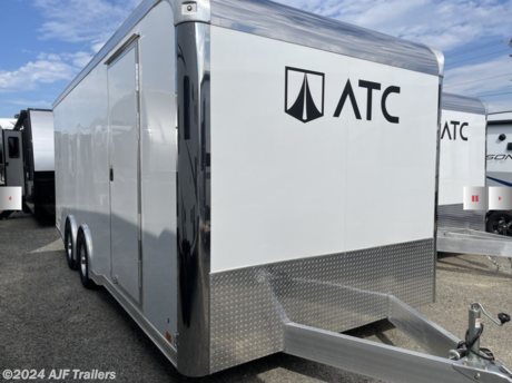 &lt;h2&gt;&lt;span style=&quot;font-size: 12pt; font-family: arial, helvetica, sans-serif;&quot;&gt;&lt;strong&gt;2023 ATC 20 FT RAVEN DELUXE ALUMINUM ENCLOSED CAR HAULER-CARGO TRAILER WITH PREMIUM ESCAPE DOOR.&amp;nbsp;&lt;/strong&gt;&lt;/span&gt;&lt;/h2&gt;
&lt;h2&gt;&lt;span style=&quot;font-size: 12pt;&quot;&gt;AJF Trailers is a proud ATC Car Hauler Dealer. We stock ATC Trailers in a variety of configurations in both car hauler &amp;amp; cargo trailers in a range of sizes &amp;amp; we offer Design Builds.&amp;nbsp; ATC trailers are hand assembled by craftsmen in Indiana using an Amish work force. ATC trailers are known for attention to detail as well as aluminum construction.&lt;/span&gt;&lt;br&gt;&lt;span style=&quot;font-size: 12pt;&quot;&gt;The frame of this ATC Raven 20 ft Car hauler is precision welded in aluminum with 16 in on center cross members. It is equipped with torsion suspension on two 5200# axles which makes this car hauler pull like a dream.&lt;/span&gt;&lt;/h2&gt;
&lt;p&gt;SPREAD AXLE&lt;/p&gt;
&lt;p&gt;D-Rings&lt;/p&gt;
&lt;p&gt;9990# GVWR&lt;/p&gt;
&lt;p&gt;WIRED AND BRACED FOR AC&lt;/p&gt;
&lt;p&gt;14 IN MANUAL ROOF VENT&lt;/p&gt;
&lt;p&gt;REAR SPOILER WITH LED LOADING LIGHTS&lt;/p&gt;
&lt;p&gt;STAINLESS STEEL VERTICALS WITH CAST CORNERS&lt;/p&gt;
&lt;p&gt;SCREWLESS EXTERIOR&lt;/p&gt;
&lt;p&gt;7 WAY TRUCK PLUG&lt;/p&gt;
&lt;p&gt;EXTENDED TONGUE&lt;/p&gt;
&lt;p&gt;ALUMINUM WHEELS WITH RADIAL TIRES&lt;/p&gt;
&lt;p&gt;SKID PLATES&lt;/p&gt;
&lt;p&gt;16 IN ON CENTER CROSS MEMBERS&lt;/p&gt;
&lt;p&gt;BRAKES BOTH AXLES&lt;/p&gt;
&lt;p&gt;5200# TORSION AXLE&lt;/p&gt;
&lt;p&gt;FULL PERIMETER ALUMINUM FRAME&lt;/p&gt;
&lt;p&gt;&lt;strong&gt;Financing Available&lt;/strong&gt;&lt;/p&gt;
&lt;p&gt;&lt;strong&gt;Pickup, Delivery or Meet Halfway&lt;/strong&gt;&lt;/p&gt;
&lt;p&gt;&lt;strong&gt;5 YR LIMITED STRUCTURAL WARRANTY&lt;/strong&gt;&lt;br&gt;&lt;strong&gt;3 YR LIMITED WARRANTY&lt;/strong&gt;&lt;br&gt;&lt;strong&gt;1 YR LIMITED ELECTRICAL WARRANTY&lt;/strong&gt;&lt;/p&gt;