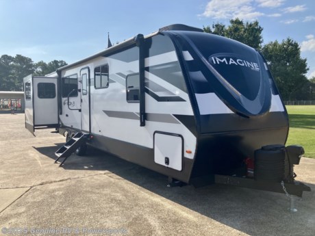 &lt;p&gt;&lt;span style=&quot;font-size: 16px;&quot;&gt;&lt;strong&gt;2024 Grand Design Imagine 3100RD Travel Trailer...&lt;/strong&gt;&lt;/span&gt;&lt;/p&gt;
&lt;p&gt;&lt;em&gt;Double Sofas&lt;/em&gt;&lt;em&gt;, Theater Seating, Solar Package...&lt;/em&gt;&lt;/p&gt;
&lt;p&gt;&lt;strong&gt;Features Include:&lt;/strong&gt;&lt;/p&gt;
&lt;ul&gt;
&lt;li&gt;Peace of Mind Package&lt;/li&gt;
&lt;li&gt;Ultimate Power Package&lt;/li&gt;
&lt;li&gt;Arctic 4-Seasons Protection Package&lt;/li&gt;
&lt;li&gt;Solar Package&lt;/li&gt;
&lt;li&gt;Goodyear Tires w/ 15&quot; Aluminum Wheels&lt;/li&gt;
&lt;li&gt;SafeRide&amp;nbsp;RV Roadside Assistance&lt;/li&gt;
&lt;li&gt;ABS Axle Assembly&lt;/li&gt;
&lt;li&gt;48&quot; Electric Fireplace&lt;/li&gt;
&lt;li&gt;15,000&amp;nbsp;btu&amp;nbsp;Ducted Air Conditioner&lt;/li&gt;
&lt;li&gt;13,500 btu&amp;nbsp;Ducted Air Conditioner&lt;/li&gt;
&lt;li&gt;Power Patio Awning - 19&#39;&lt;/li&gt;
&lt;li&gt;Table &amp;amp; Chairs Dinette&lt;/li&gt;
&lt;li&gt;10 cf 12v/DC Refrigerator/Freezer&lt;/li&gt;
&lt;li&gt;Theater Seating&lt;/li&gt;
&lt;li&gt;50&quot; LED Television&lt;/li&gt;
&lt;/ul&gt;
&lt;p&gt;&lt;span style=&quot;font-style: italic; font-weight: bold;&quot;&gt;Our Sale Price Includes: &amp;nbsp;Pre-Delivery Inspection, RV/Marine Battery, Propane Bottles Filled, Walk Thru Orientation &amp;amp; Factory Freight Charges.&lt;/span&gt;&lt;/p&gt;