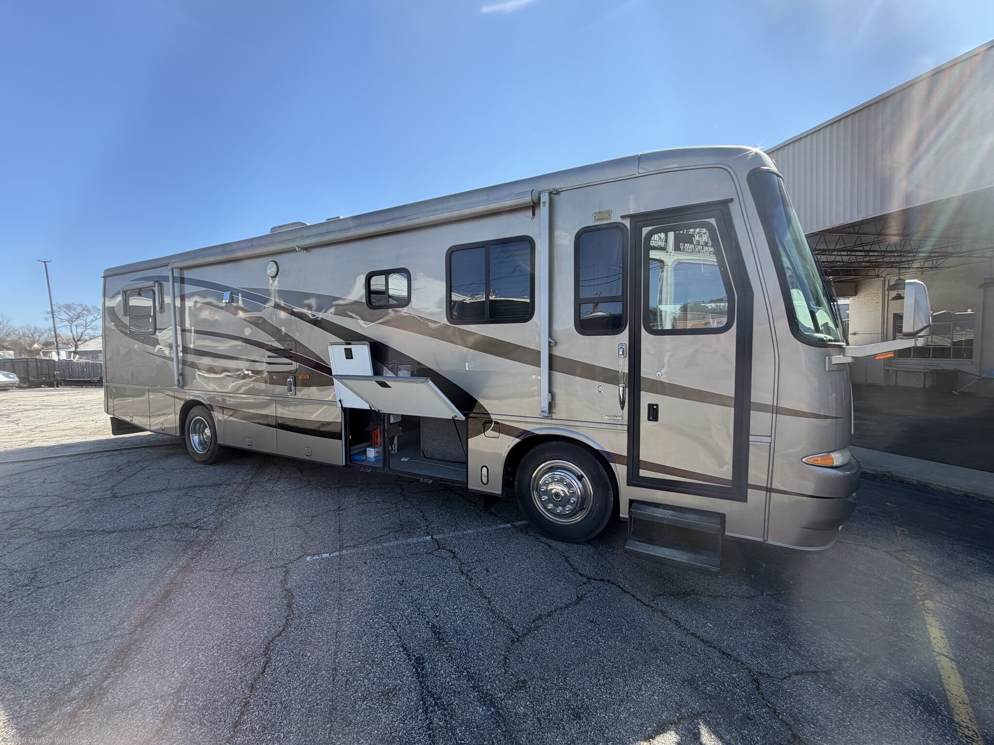 2003 Newmar Kountry Star 3705 - Used Class A For Sale by Quality Wheelz in Hot Springs, Arkansas features Generator, Toilet, Roof Vents, 50 Amp Service, Stereo System