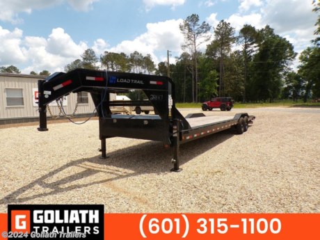 &lt;p&gt;Used Repo.&lt;/p&gt;
&lt;p&gt;102&quot; x 32&#39; Tandem Gooseneck Equipment Trailer&lt;/p&gt;
&lt;ul class=&quot;m-t-sm&quot;&gt;
&lt;li&gt;8&quot; Channel Frame&lt;/li&gt;
&lt;li&gt;2 - 7,000 Lb Dexter Spring Axles ( Electric FSA Brakes on both axles)&lt;/li&gt;
&lt;li&gt;ST235/80 R16 LRE 10 Ply.&amp;nbsp;&lt;/li&gt;
&lt;li&gt;Coupler 2-5/16&quot; Adj. Rd.12&quot; X 14lb.(Standard Neck &amp;amp; Coupler)&lt;/li&gt;
&lt;li&gt;Treated Wood Floor w/2&#39; Dove Tail&amp;nbsp;&lt;/li&gt;
&lt;li&gt;Drive-Over Fenders 9&quot; (weld-on)&lt;/li&gt;
&lt;li&gt;REAR Slide-IN Ramps 5&#39; x 16&quot;&amp;nbsp;&lt;/li&gt;
&lt;li&gt;16&quot; Cross-Members&lt;/li&gt;
&lt;li&gt;Jack Spring Loaded Drop Leg 2-10K&lt;/li&gt;
&lt;li&gt;Lights LED (w/Cold Weather Harness)&lt;/li&gt;
&lt;li&gt;Front Tool Box (Full Width Between Risers)&lt;/li&gt;
&lt;li&gt;Winch Plate (8&quot; Channel)&lt;/li&gt;
&lt;li&gt;2&quot; - Rub Rail&lt;/li&gt;
&lt;li&gt;Stud Junction Box&lt;/li&gt;
&lt;li&gt;Black (w/Primer)&lt;/li&gt;
&lt;li&gt;
&lt;p class=&quot;MsoNormal&quot;&gt;If you are interested in this trailer, please contact the Dealership to ensure that this trailer is still available. All Trailers are discounted for Cash or Finance Price. Pricing of trailers on this web site may include options that may have been installed at the Dealership. The prices on the website do not include tax, title, plate and doc fees. Please contact the Dealership for latest pricing. Published price subject to change without notice to correct errors or omissions or in the event of inventory fluctuations. We charge a convenience fee on credit card purchases. Please contact store by email or phone for additional details.&lt;/p&gt;
&lt;p class=&quot;MsoNormal&quot;&gt;While every effort has been made to ensure display of accurate data, the listings within this web site may not reflect all accurate items. Accessories, color and options may vary. All Inventory listed is subject to prior sale. The trailer photo displayed may be an example only. Trailer Photos may not match exact trailer. Please confirm price with Dealership. See Dealership for details.&lt;/p&gt;
&lt;/li&gt;
&lt;/ul&gt;