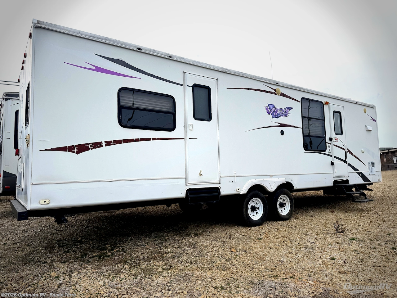 2009 Keystone VR1 323FKS - Used Travel Trailer For Sale by Optimum RV - Bonne Terre in Bonne Terre, Missouri features Slideout
