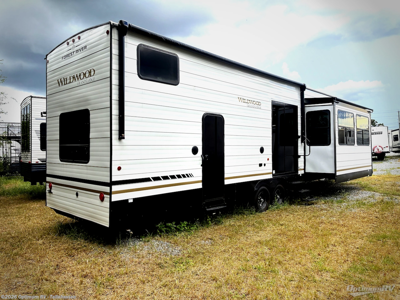 2027 Forest River Wildwood Grand Lodge 42FLDL - New Destination Trailer For Sale by Optimum RV - Tallahassee in Tallahassee, Florida features Awning, Slideout