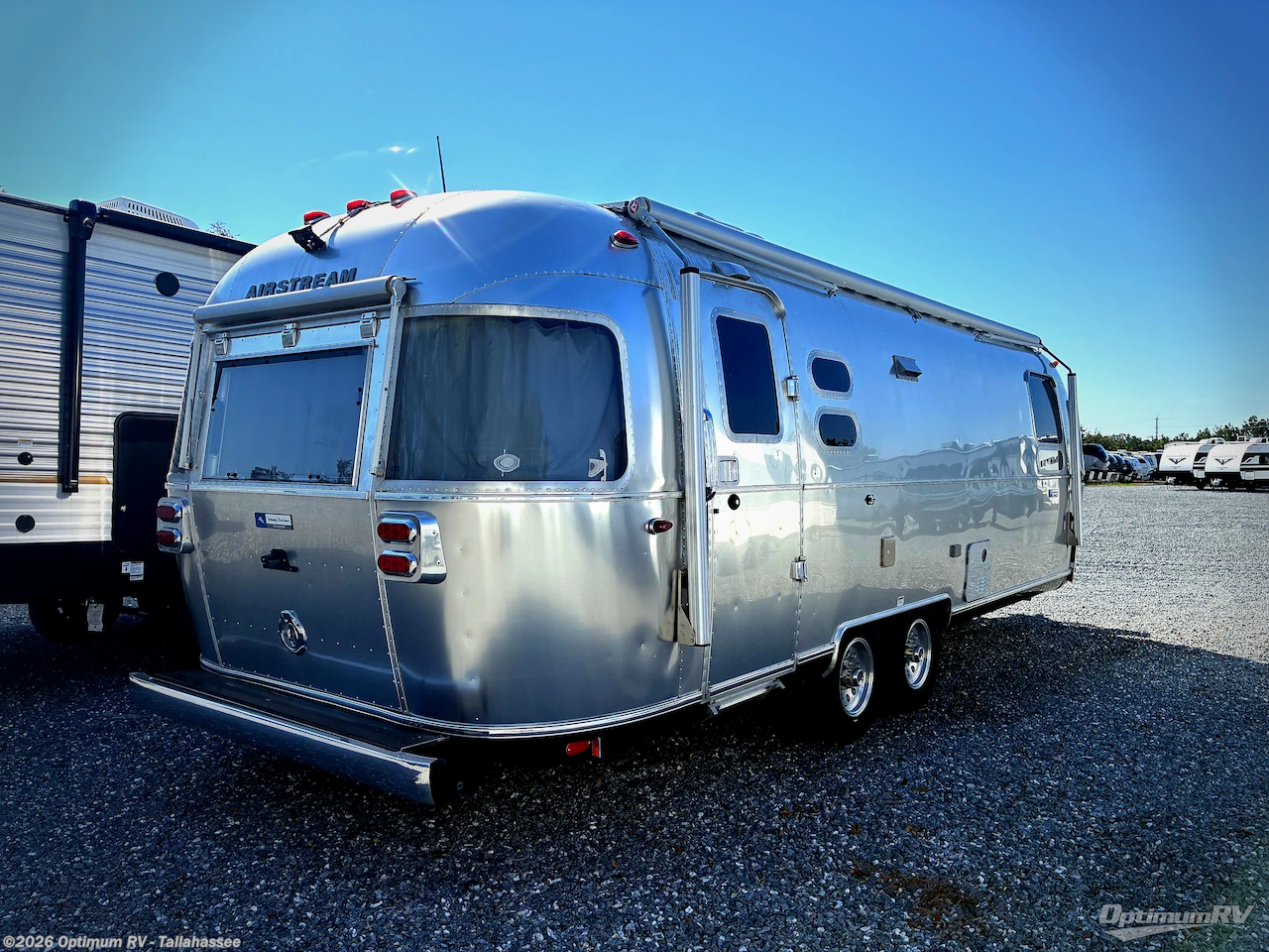 2019 Airstream Tommy Bahama 27FB - Used Travel Trailer For Sale by Optimum RV - Tallahassee in Tallahassee, Florida features Awning