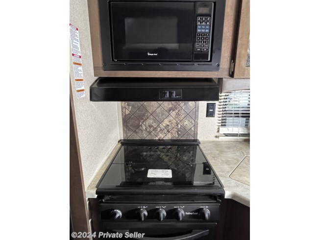 stove/oven/microwave and 11cu ft. fridge