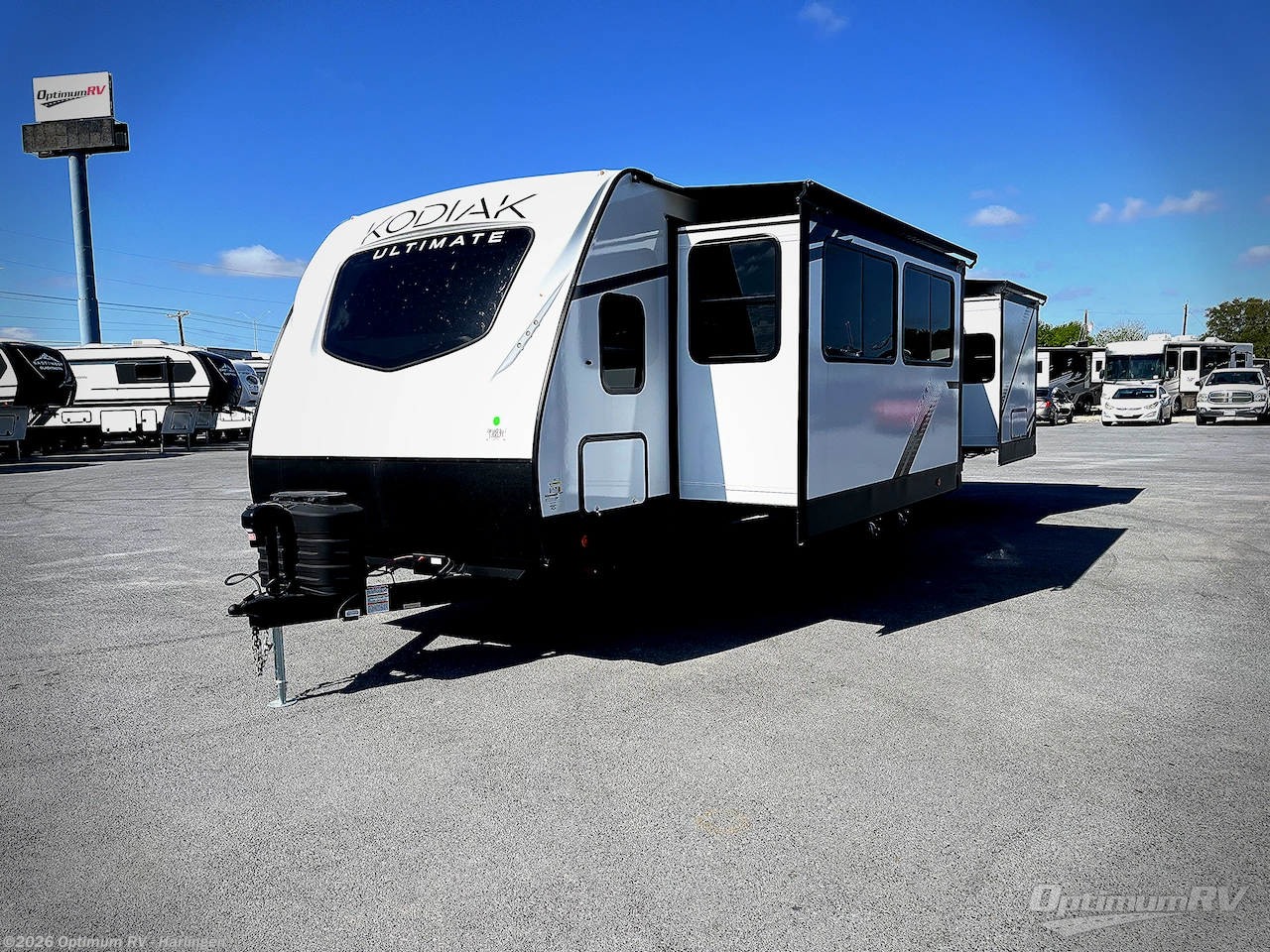 2025 Dutchmen Kodiak Ultimate 3371FLSL - New Travel Trailer For Sale by Optimum RV - Harlingen in La Feria, Texas features Slideout, Awning