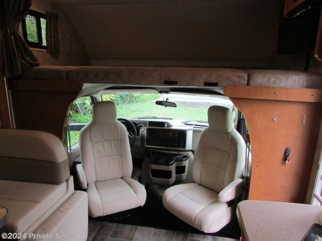 Swivel cab seats - Driving forward and relaxing with family.