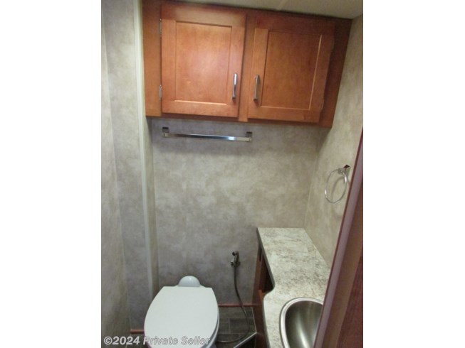 Toilet with large vanity with storage 