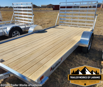 | Model Number | FIT1281-P | |------------|---------| | Bed Width (in.) | 80.75&#39; | | Bed Length (in.) | 144&#39; | | Deck Type | Wood Plank | | Tie Downs | (4) D-Rings 21790 | | Overall Width (in.) | 101.91&#39; | | Overall Length (in.) | 182&#39; | | Ramp Standard | Straight | | Ramp Option | Bifold | | Tilt Bed | No | | Carrying Capacity w/o Brakes (lb.) | 2,261 lb | | GVWR w/o Brakes (lb.) | 2,995 lb | | Carrying Capacity with Brakes (lb.) | 2,766 lb | | GVWR with Brakes (lb.) | 3,500 lb | | Trailer Weight | 734 lb | | No. Of Axles | 1 | | Hitch Height (in.) | 16&#39; | | Deck Height (in.) | 19.25&#39; | | Standard Tires | ST205/75D14 Steel | | Tire Upgrade Options | ST205/75R14 Aluminum T08, ST205/75R14 Aluminum Machine Lip, ST205/75R14C Steel | | Tongue Jack | Yes | | Coupler (in.) | 2&#39; | | Brake Standard | N/A | | Brake Options | Electric | Excludes tax, tag, title and registration fees. Dealer documentation fee of $389 not included in price