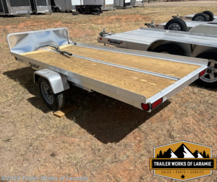 | Model Number | XT4.5 QP | |------------|--------| | Number of Sleds | 1 | | Axle Type | Single | | Bed Width (in.) | 53&#39; | | Bed Length (in.) | 120&#39; | | Overall Length (in.) | 172&#39; | | Ramp Standard | No | | Tilt Bed | Yes | | Carrying Capacity w/o Brakes (lb.) | 1,350 lb | | GVWR w/o Brakes (lb.) | 1,700 lb | | Trailer Weight | 350 lb | | Hitch Height | 17&#39; | | Deck Height | 21&#39; | | Standard Tires | 18.5x8C | | Tire Upgrade Options | 5.30x12C | | Straight Pole or Wishbone Tongue | Straight Pole | Excludes tax, tag, title and registration fees. Dealer documentation fee of $389 not included in price.