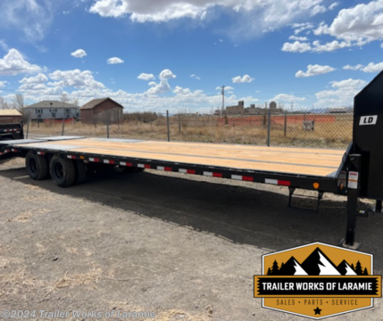 32&#39; Low-Pro Flatdeck with Duals LD:32&#39; Low-Pro Flatdeck with Duals Q:GN 2 5/16&#39; Square (30,000 lb.) A2BS:(2) 10,000# Axles Electric / Spring W:5&#39; Dovetail w/ 2 Flip-over Monster Ramps K:Primer + Black Powder Coat Excludes tax, tag, title and registration fees. Dealer documentation fee of $389 not included in price.