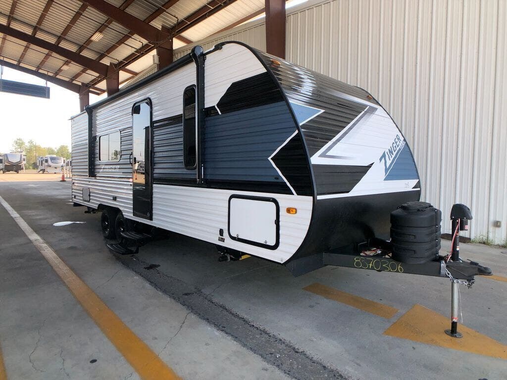 2025 CrossRoads Zinger Lite 252BH - New Travel Trailer For Sale by Ashley Marine & RV in Panama City, Florida features Medicine Cabinet, Oven, Shower, Stabilizer Jacks, Air Conditioning