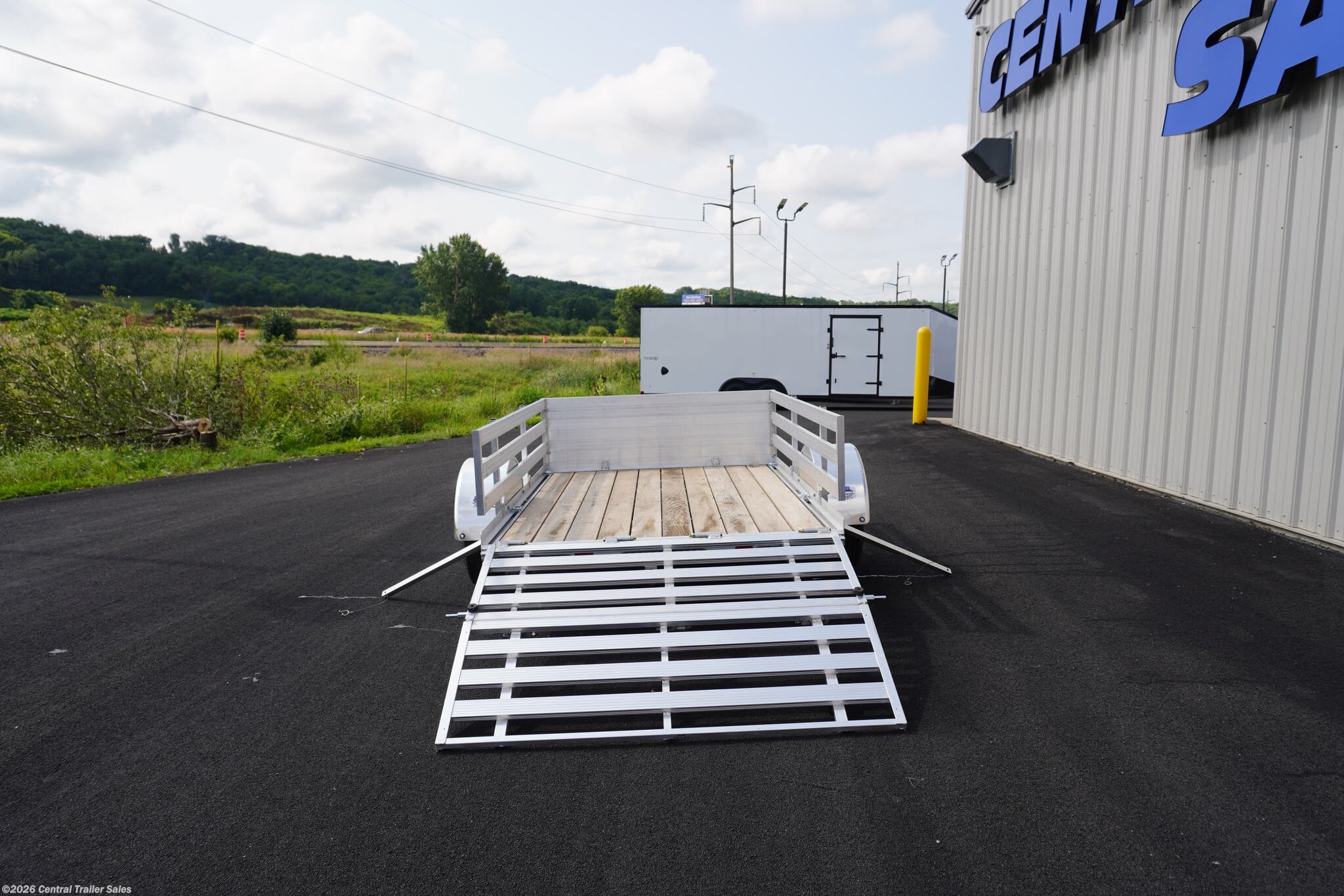 2025 FIT Series 64"x8' Aluminum Utility W/Wood Deck &amp; Rail Sides by Triton Trailers from Central Trailer Sales in Jordan, Minnesota