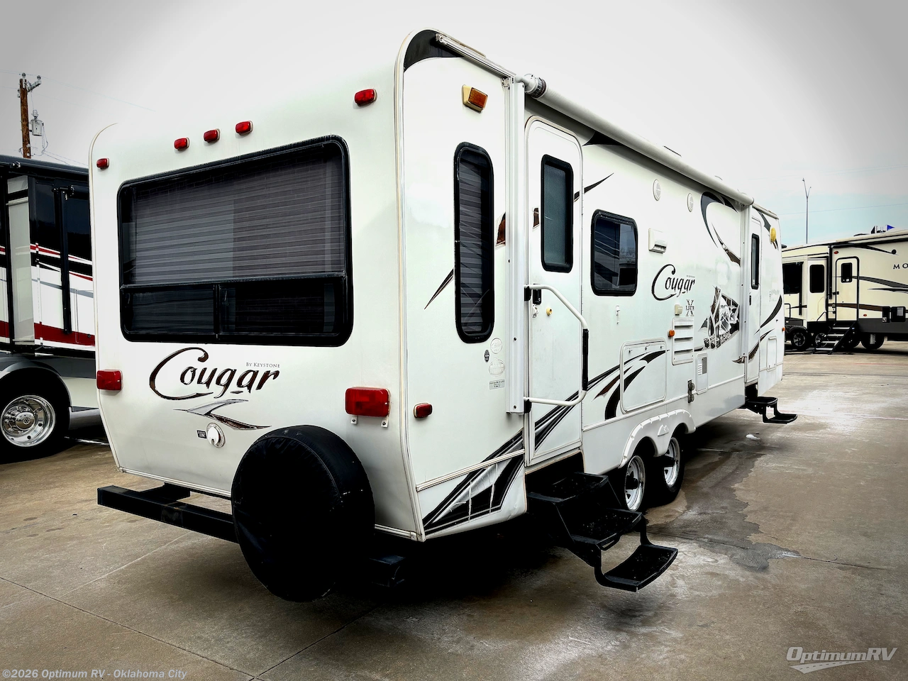 2010 Keystone Cougar X-Lite 27RLS - Used Travel Trailer For Sale by Optimum RV - Oklahoma City in Moore, Oklahoma features Slideout