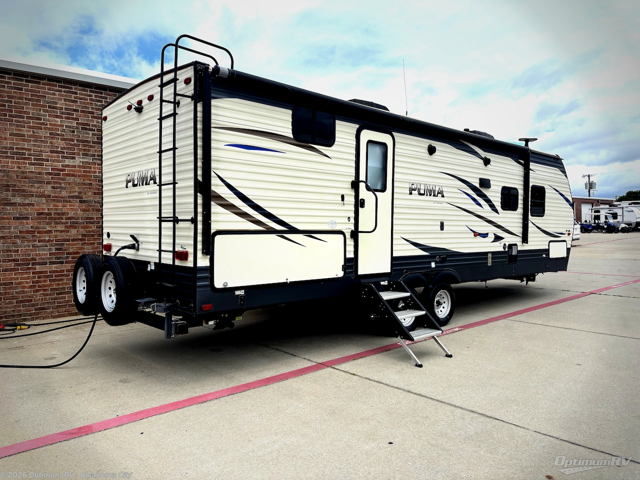 2019 Palomino Puma 28FQDB - Used Travel Trailer For Sale by Optimum RV - Oklahoma City in Moore, Oklahoma features Slideout, Awning