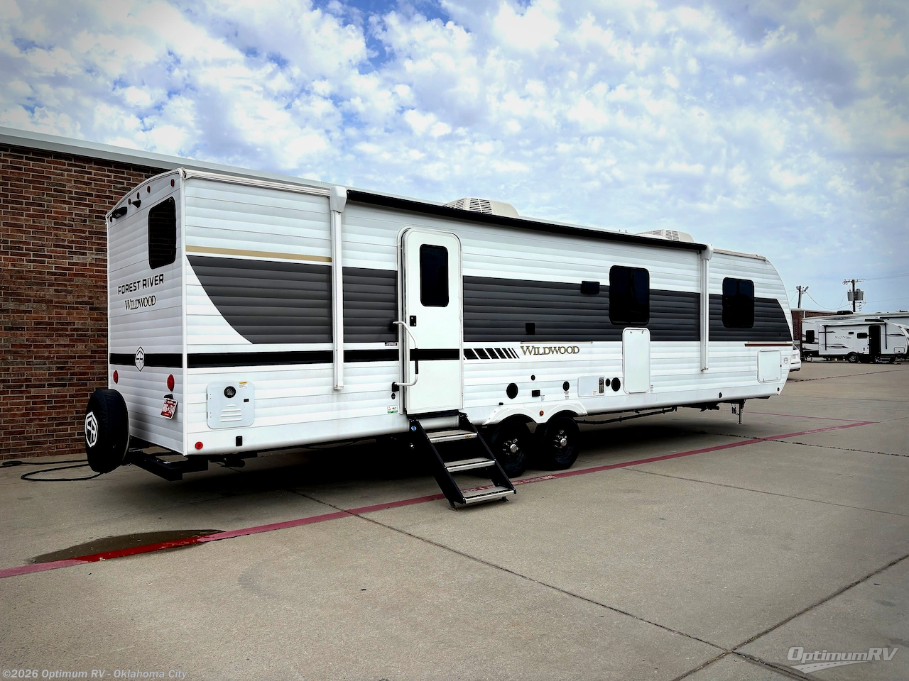 2025 Forest River Wildwood 29BDB - Used Travel Trailer For Sale by Optimum RV - Oklahoma City in Moore, Oklahoma features Slideout, Awning