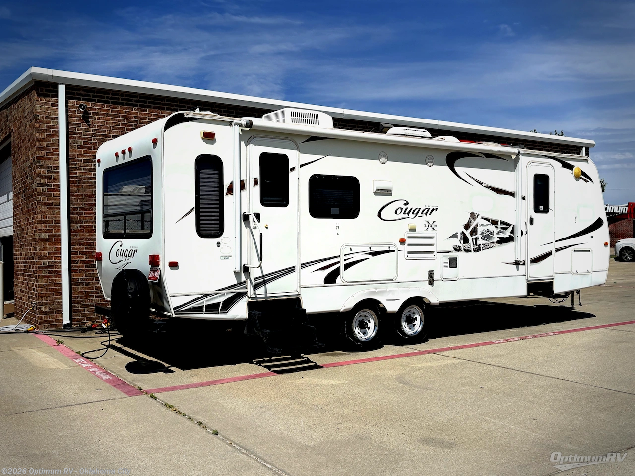 2010 Keystone Cougar X-Lite 26RLS - Used Fifth Wheel For Sale by Optimum RV - Oklahoma City in Moore, Oklahoma features Slideout