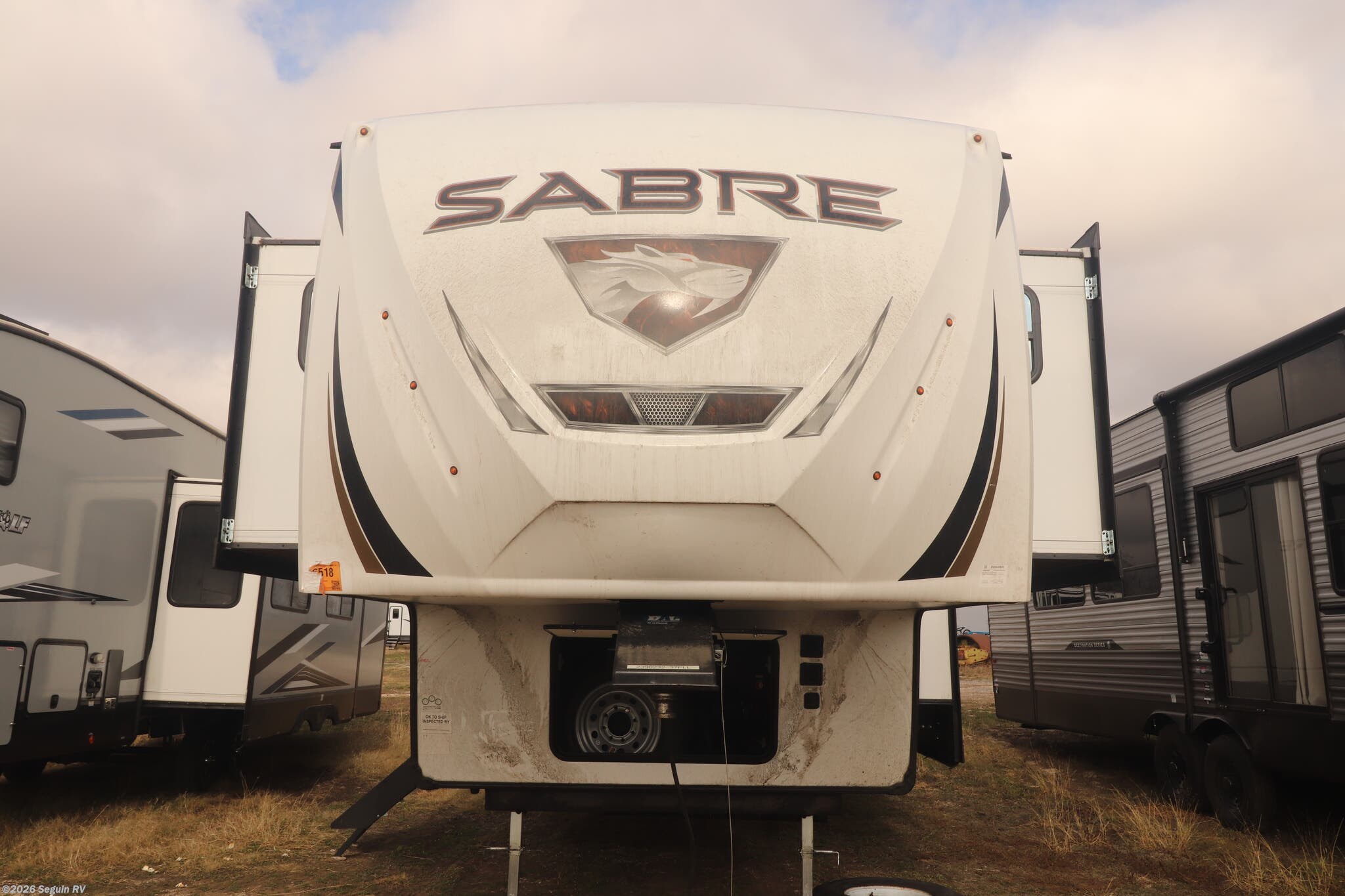 2024 Forest River Sabre 37FLL - Used Fifth Wheel For Sale by Seguin RV in Seguin, Texas features Awning, Power Awning, Washer/Dryer Prep, Ceiling Fan, Detachable