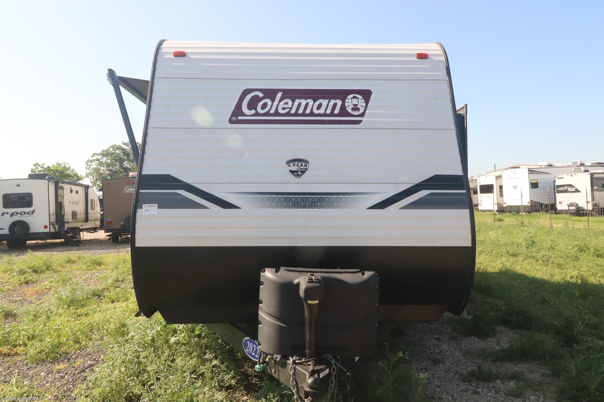 2022 Dutchmen Coleman Lantern LT 262BH - Used Travel Trailer For Sale by Seguin RV in Seguin, Texas features Smoke Detector, Air Conditioning, LP Detector, Toilet, Stove