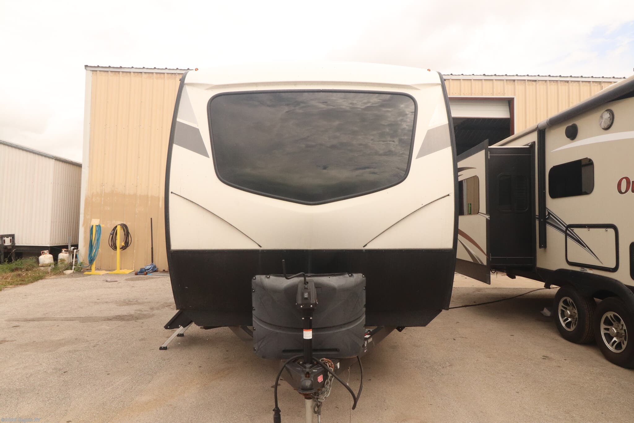 2021 Dutchmen Coleman Rubicon 1628BH - Used Travel Trailer For Sale by Seguin RV in Seguin, Texas features Refrigerator, Toilet, Leveling Jacks, 30 Amp Service, External Shower
