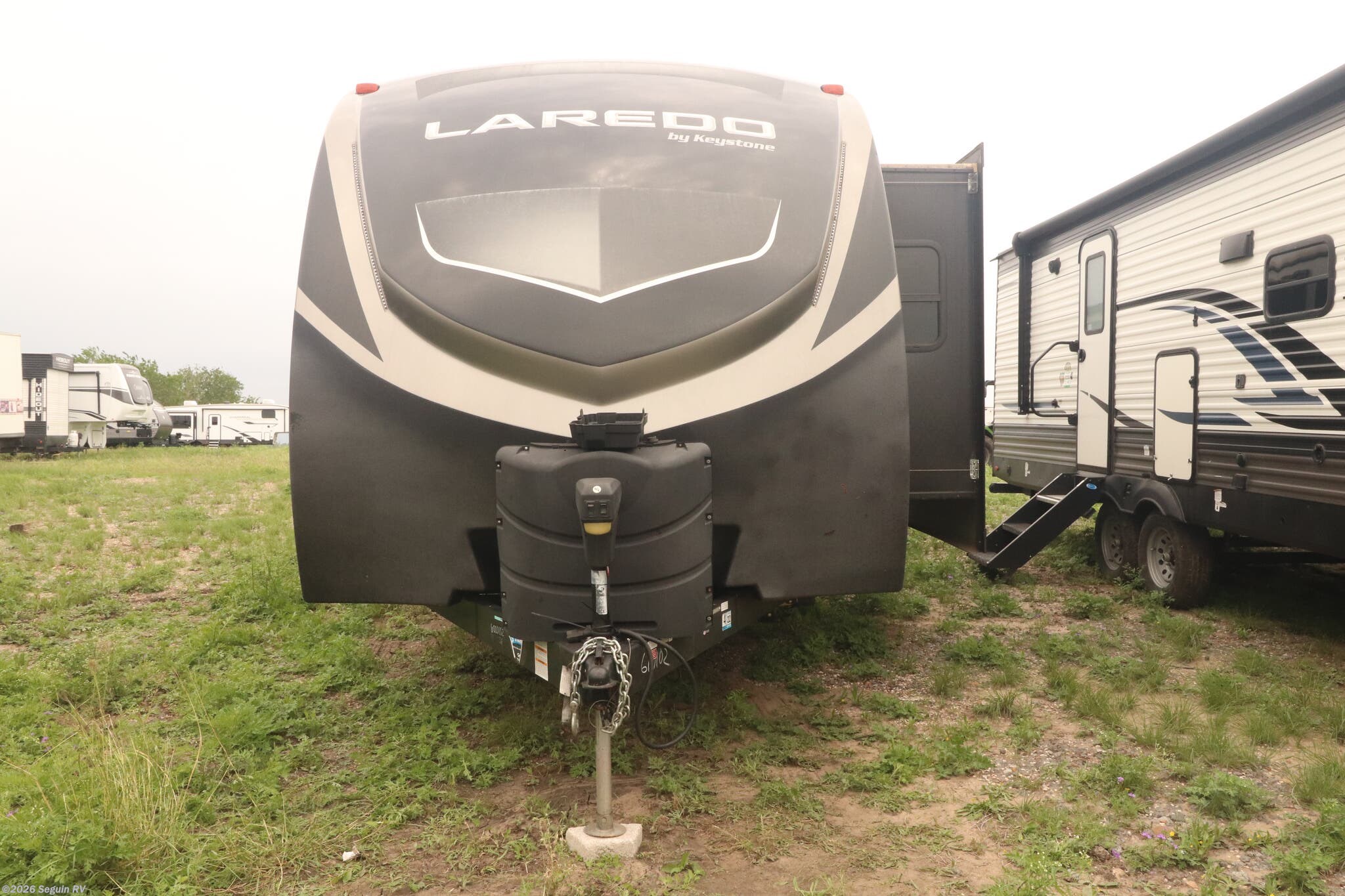 2020 Keystone Laredo 335MK - Used Travel Trailer For Sale by Seguin RV in Seguin, Texas features Theater Seating, LP Detector, CO Detector, Stereo System, Leveling Jacks