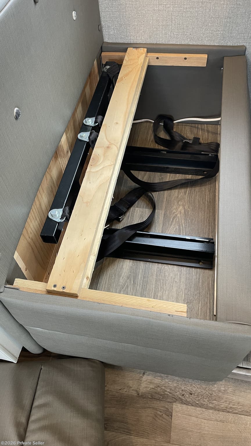 Storage exposed under left dining bench seat