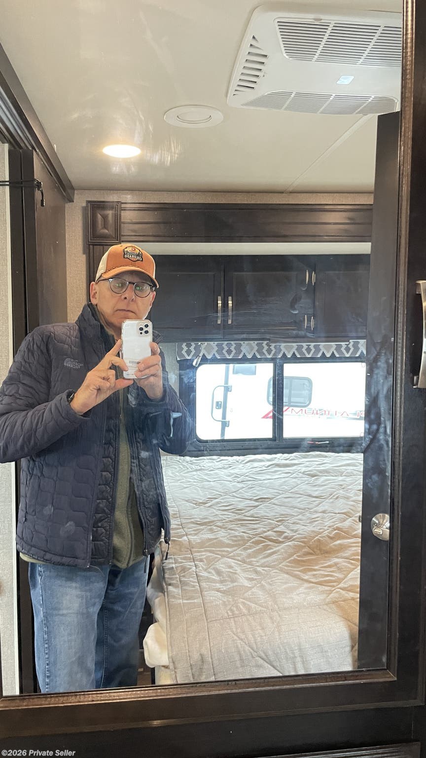 Cabinet storage over jack-knife sofa