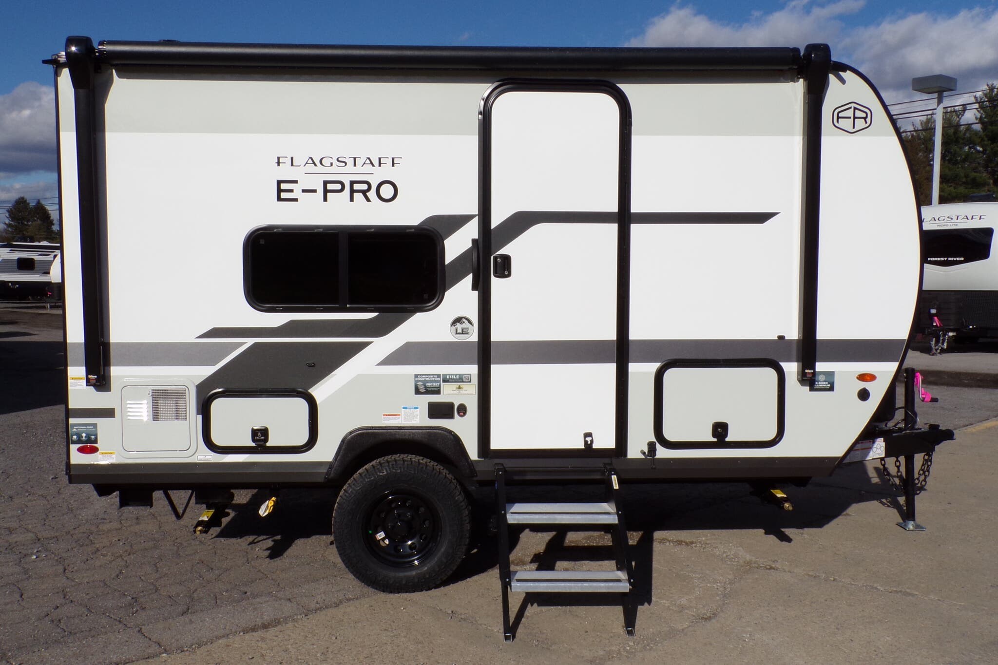 2026 Forest River Flagstaff E-Pro E13LE - New Travel Trailer For Sale by Hometown RV LLC in Brockway, Pennsylvania features 30 Amp Service, Propane, Water Heater, Tinted Windows, Aluminum Entrance Steps