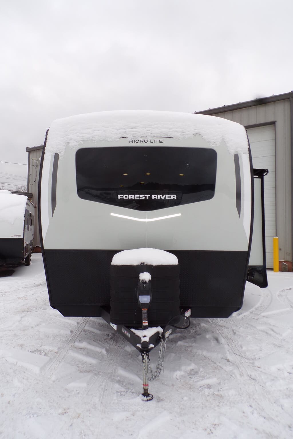 2026 Forest River Flagstaff Micro Lite 22FBS - New Travel Trailer For Sale by Hometown RV LLC in Brockway, Pennsylvania features Roof Vents, Oven, Power Awning, Backup Camera, Removable Table