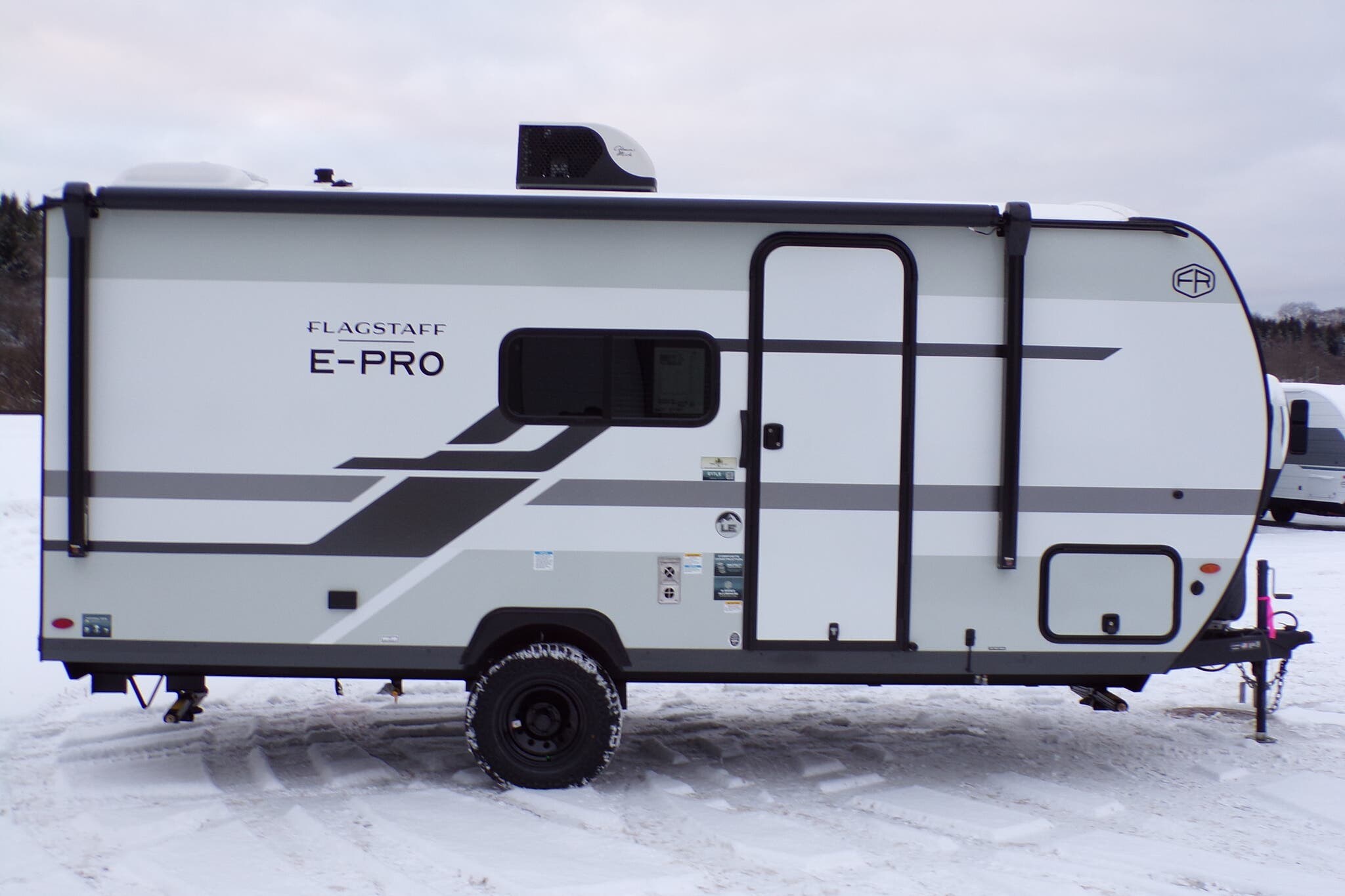 2026 Forest River Flagstaff E-Pro 17LE - New Travel Trailer For Sale by Hometown RV LLC in Brockway, Pennsylvania features Pass Thru Storage, Roof Vent, 30 Amp Service, Power Awning, Toilet