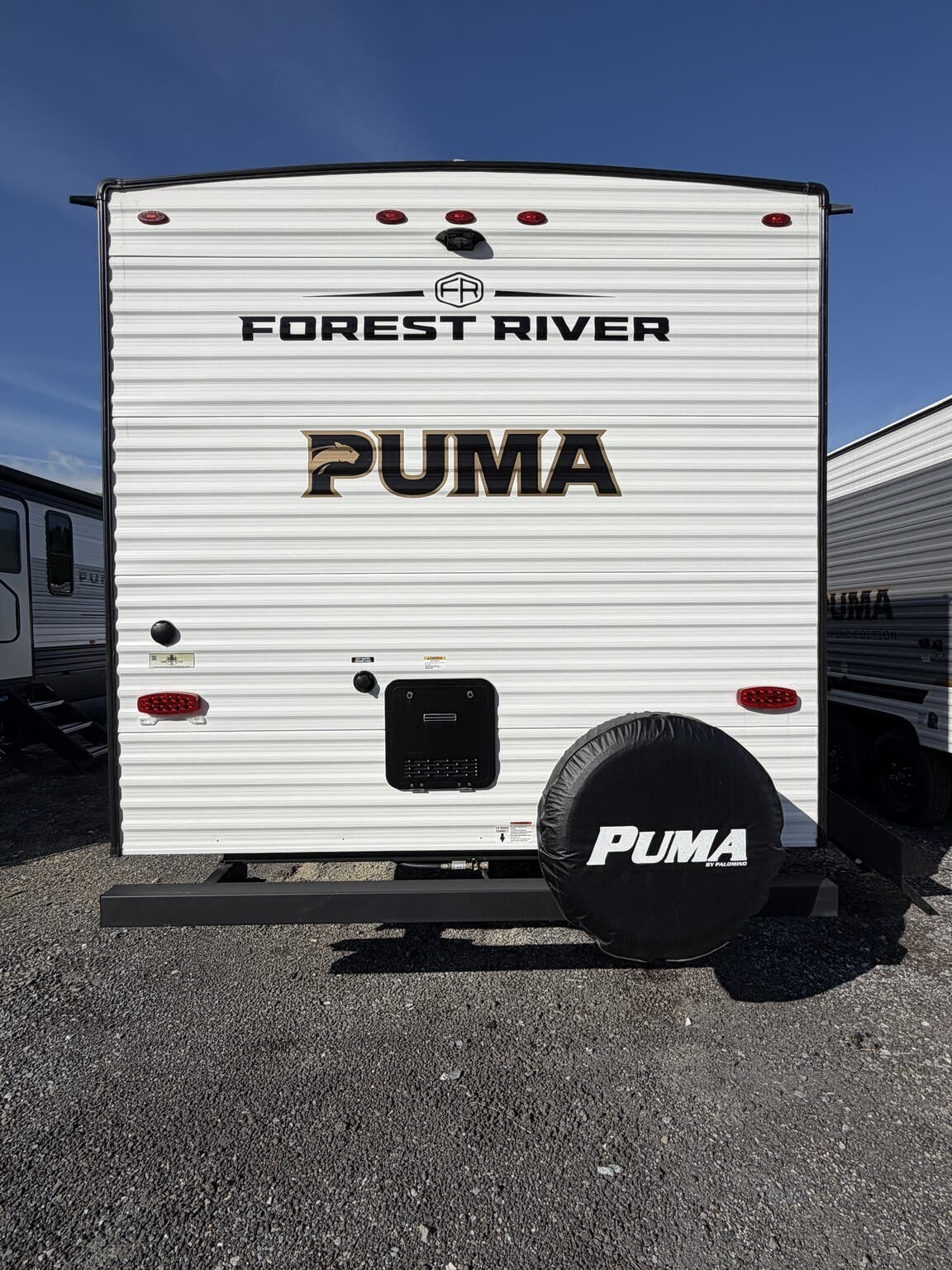 2026 Forest River Puma Camping Edition 284BHCE - New Travel Trailer For Sale by Hometown RV LLC in Brockway, Pennsylvania features Tankless Demand Gas Water Heater, Pleated Shades, Microwave, Spare Tire Kit, CO Detector