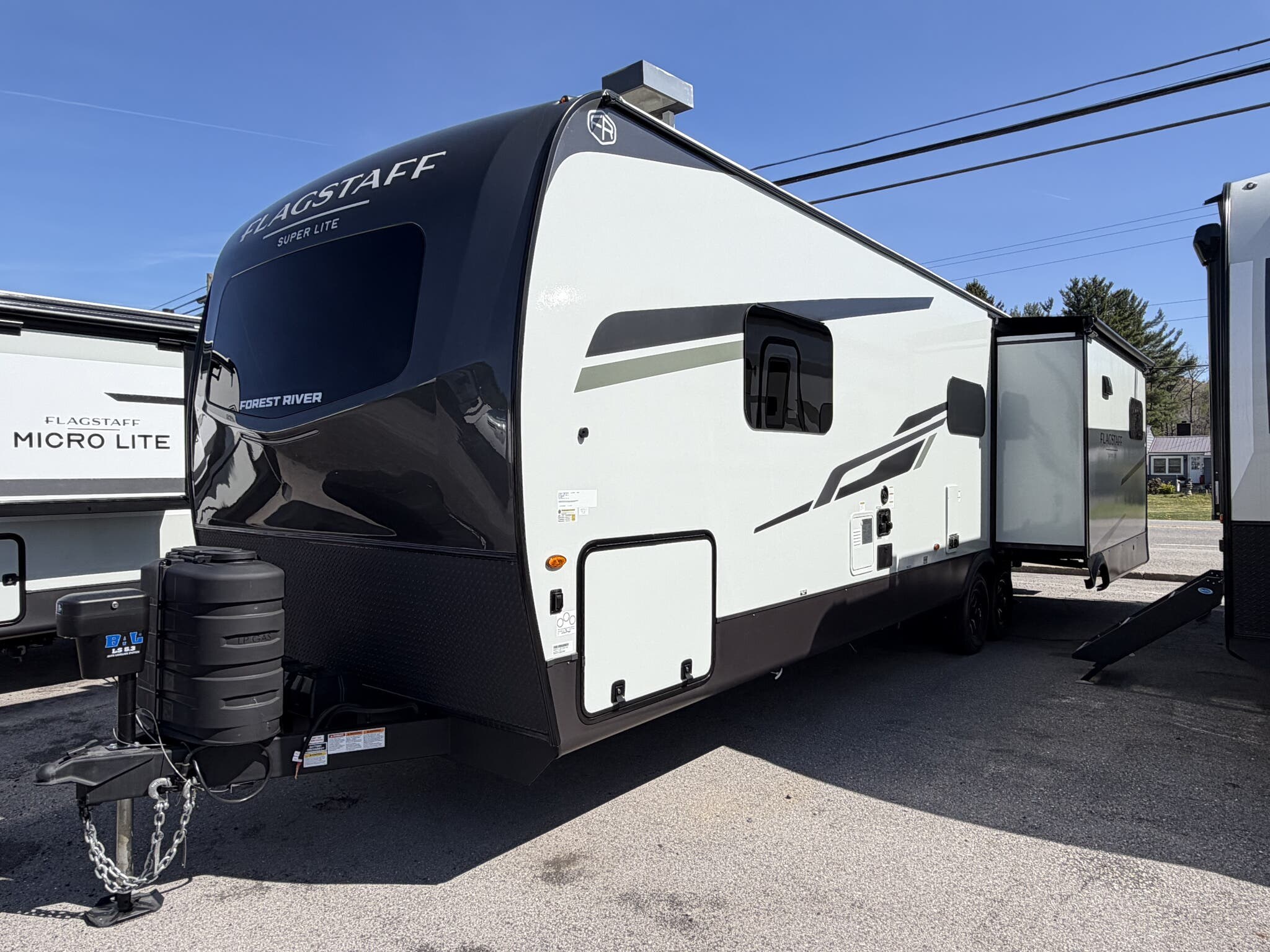 2026 Forest River Flagstaff Super Lite 29SRL - New Travel Trailer For Sale by Hometown RV LLC in Brockway, Pennsylvania features Second Roof A/C, Automatic Leveling Jacks, External Shower, Theater Seating, Slam Latch Baggage Doors