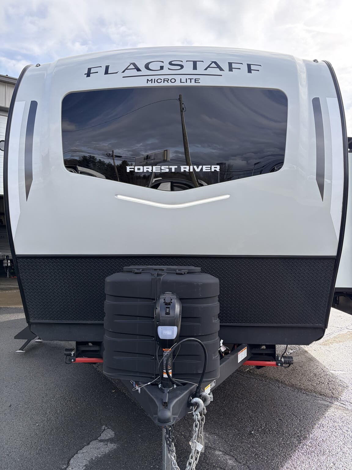 2026 Forest River Flagstaff Micro Lite 25BRDS - New Travel Trailer For Sale by Hometown RV LLC in Brockway, Pennsylvania features Slideout, Queen Mattress, Power Hitch Jack, Smoke Detector, Ladder