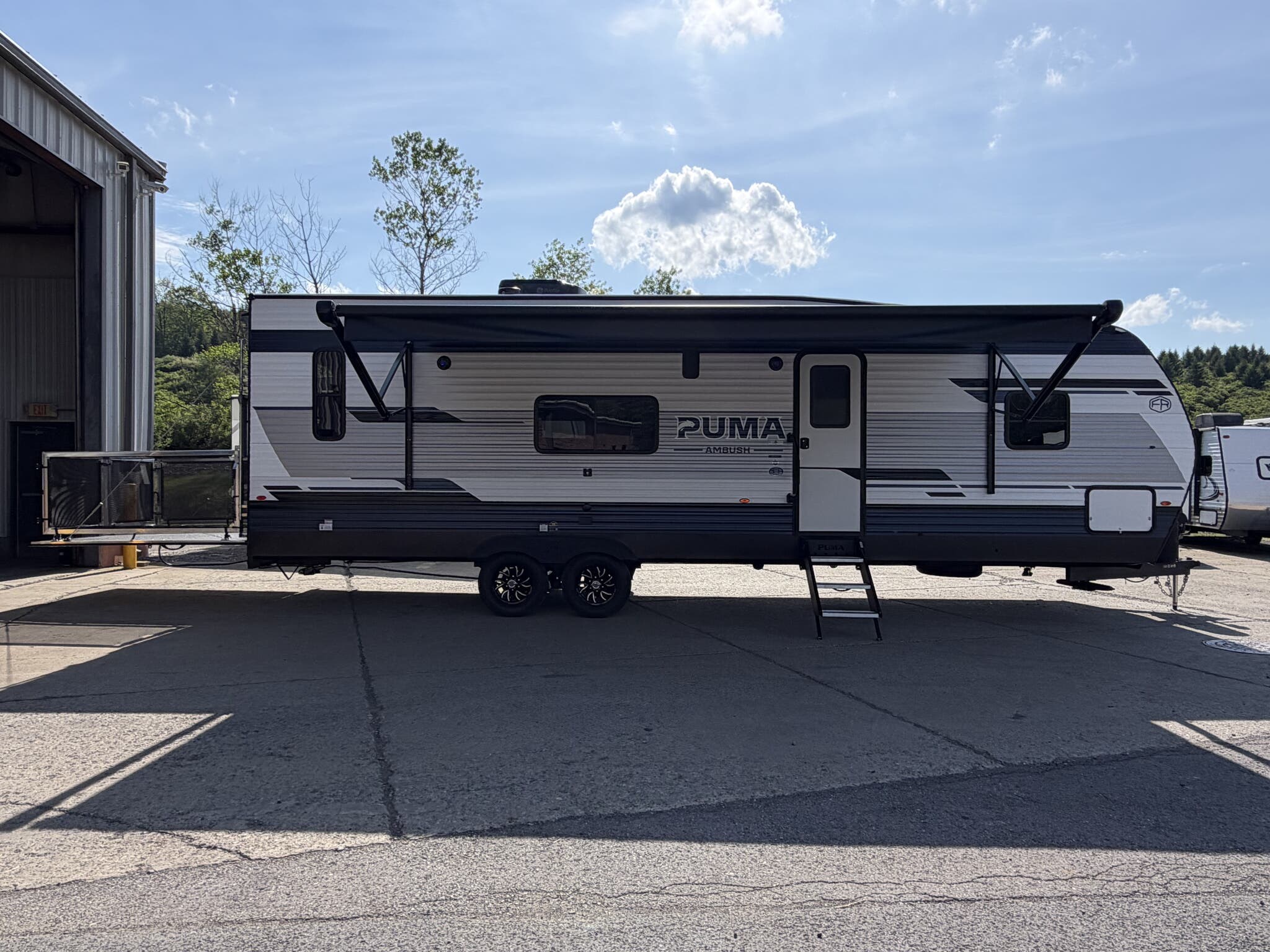 2026 Forest River Puma Ambush 27TH - New Toy Hauler For Sale by Hometown RV LLC in Brockway, Pennsylvania features CO Detector, Tinted Windows, LED Lights, Toilet, Booth Dinette