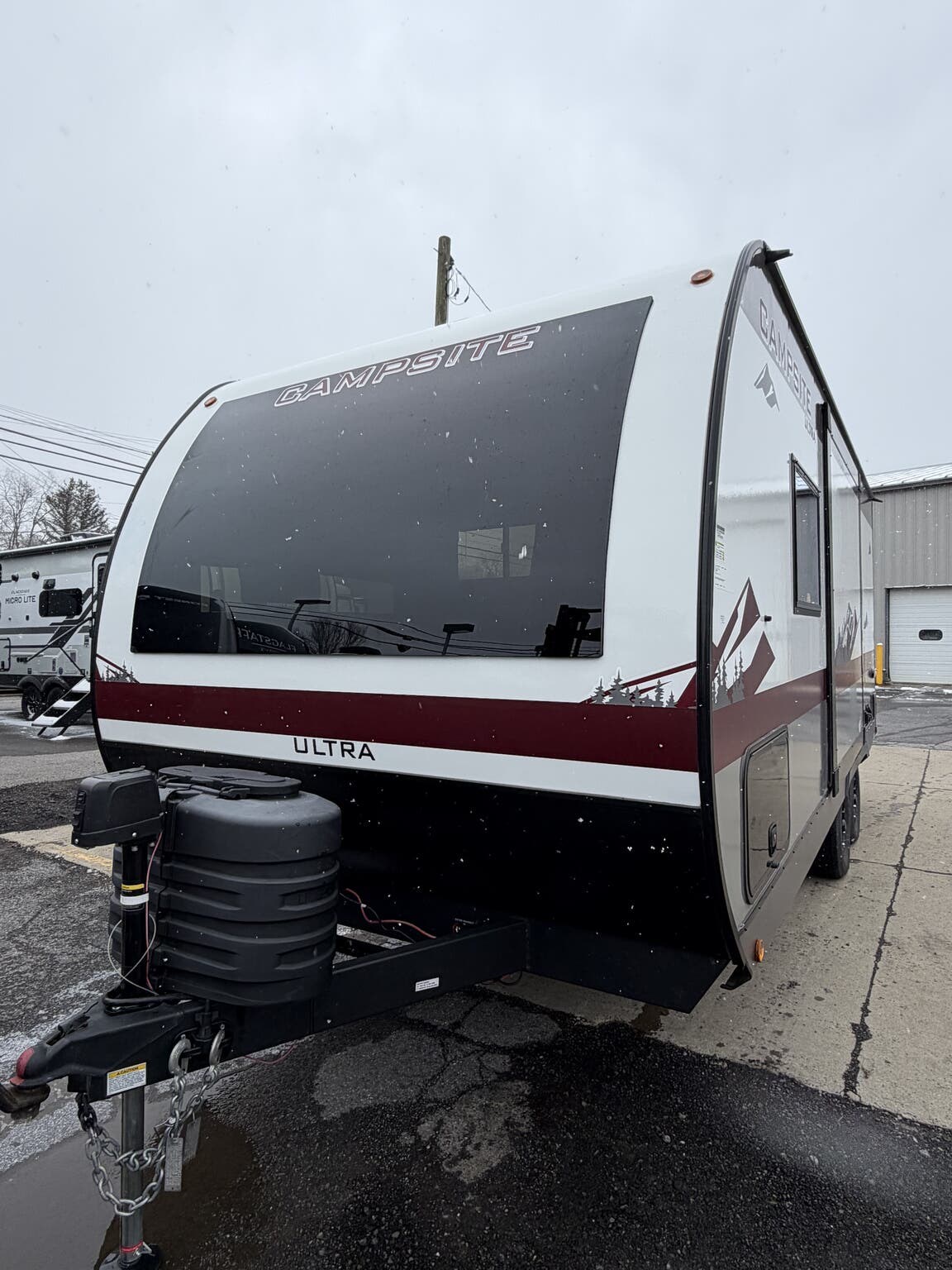 2025 Forest River Campsite Ultra 19KB - Used Travel Trailer For Sale by Hometown RV LLC in Brockway, Pennsylvania features Propane, Detachable Power Cord, Power Awning, Screen Door, Pass Thru Storage