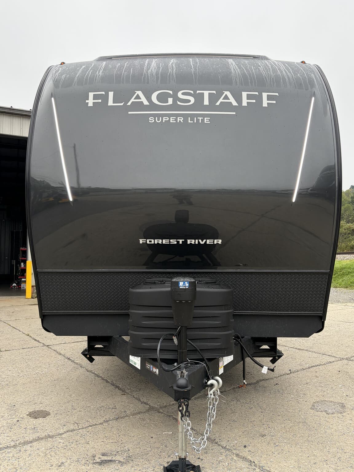 2027 Forest River Flagstaff Super Lite 27RKS - New Travel Trailer For Sale by Hometown RV LLC in Brockway, Pennsylvania features Wardrobe(s), Stabilizer Jacks, Pass Thru Storage, External Shower, Ladder