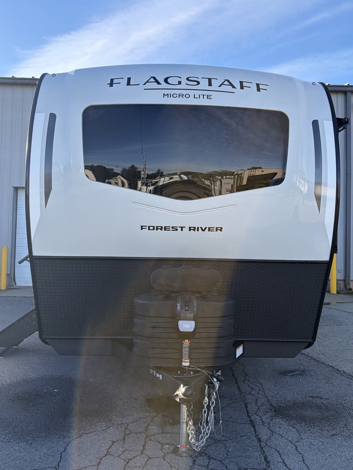 2027 Forest River Flagstaff Micro Lite 25SRK - New Travel Trailer For Sale by Hometown RV LLC in Brockway, Pennsylvania features Black Tank Flush, Roof Vents, Aluminum Entrance Steps, Queen Mattress, CO Detector