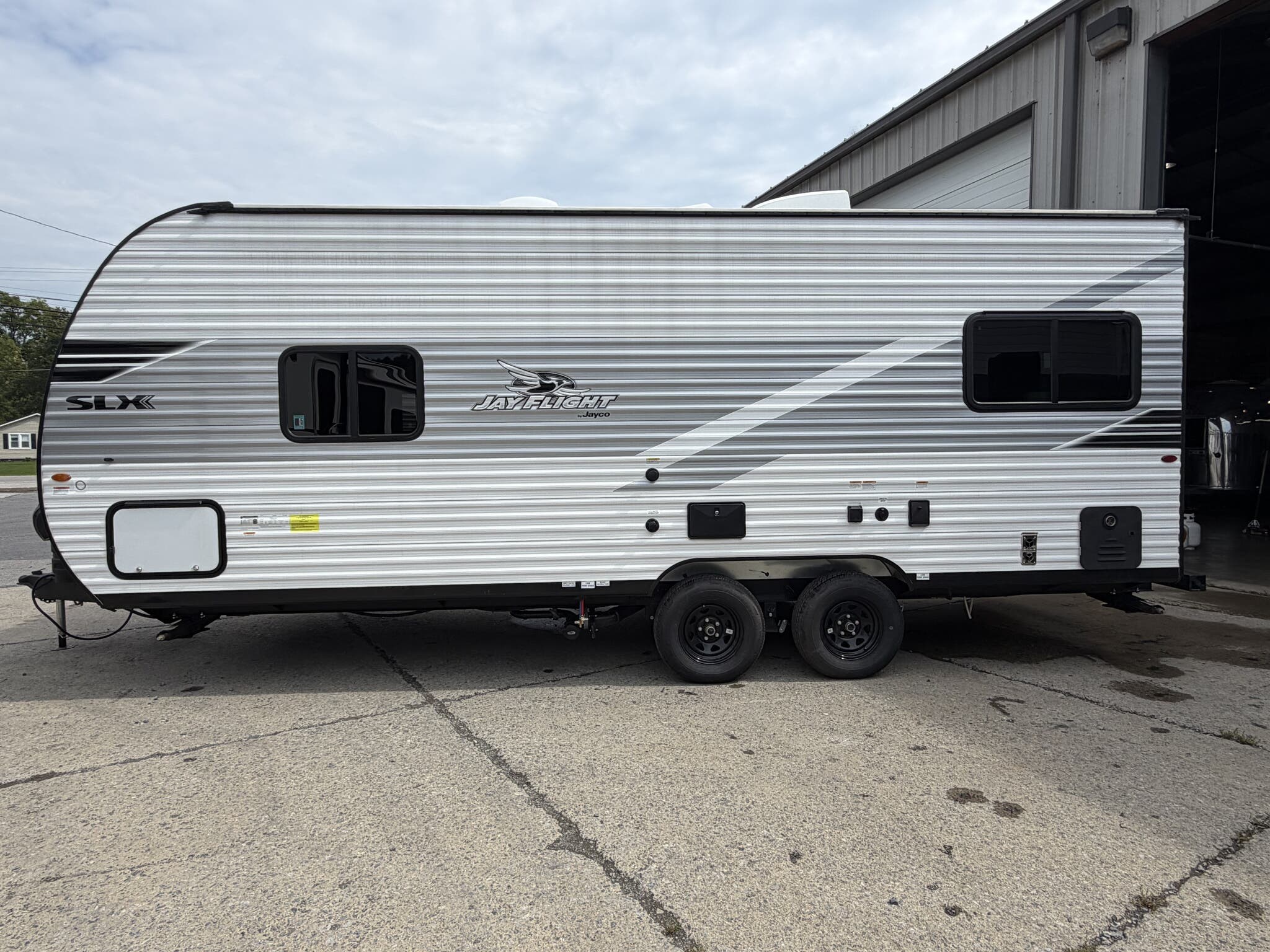 2025 Jayco Jay Flight SLX 210QBW - Used Travel Trailer For Sale by Hometown RV LLC in Brockway, Pennsylvania features Dinette, Water Heater, CO Detector, LP Detector, Furnace