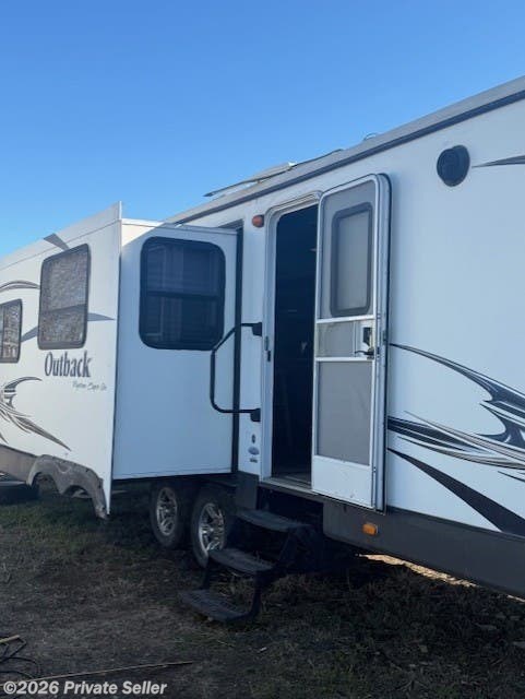 2014 Keystone Outback 316RL - Used Travel Trailer For Sale by For Sale By Owner in Whitewright, Texas features Spare Tire Kit, Hydraulic Jack, Skylight, Stove Top Burner, Microwave