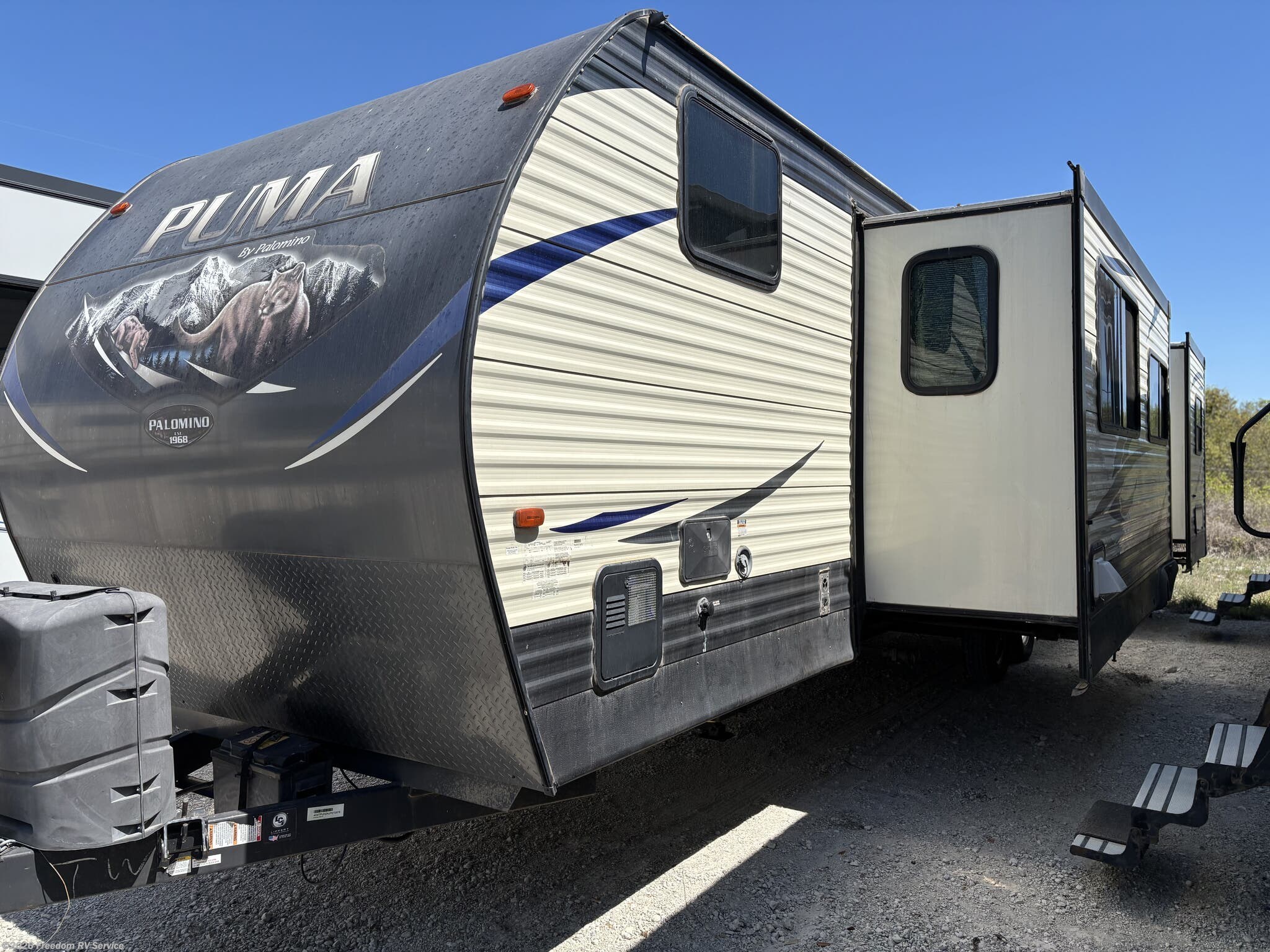 2018 Forest River Puma 32FBIS - Used Travel Trailer For Sale by Freedom RV Service in Aransas Pass, Texas features Oven, Slideout, Awning, Power Awning, Toilet