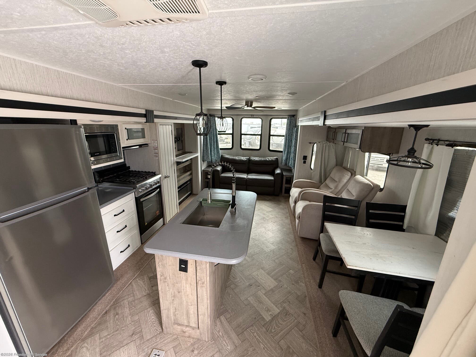 2021 Forest River Puma - Used Destination Trailer For Sale by Freedom RV Service in Aransas Pass, Texas features Icemaker, Water Heater, 50 Amp Service, Microwave, Washer