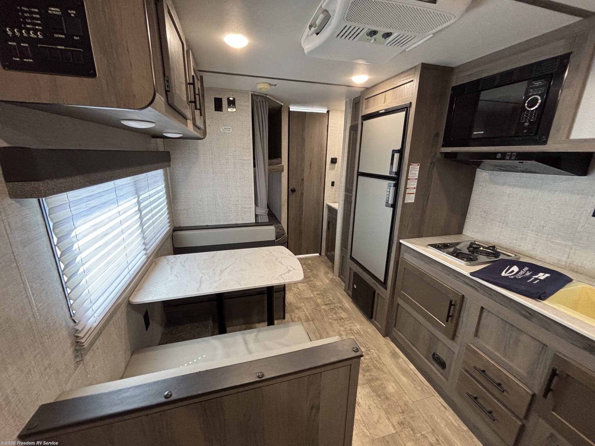 2021 Gulf Stream Enlighten 25BH - Used Travel Trailer For Sale by Freedom RV Service in Aransas Pass, Texas features 30 Amp Service, Air Conditioning, Toilet, Refrigerator, Fire Extinguisher