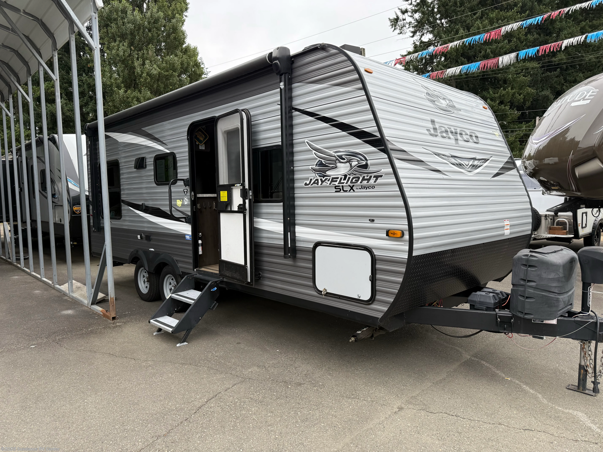 2021 Jayco Jay Flight 212QB - Used Travel Trailer For Sale by Sundance RV Center in Shelton, Washington features Converter, CO Detector, Refrigerator, Water Heater, Oven