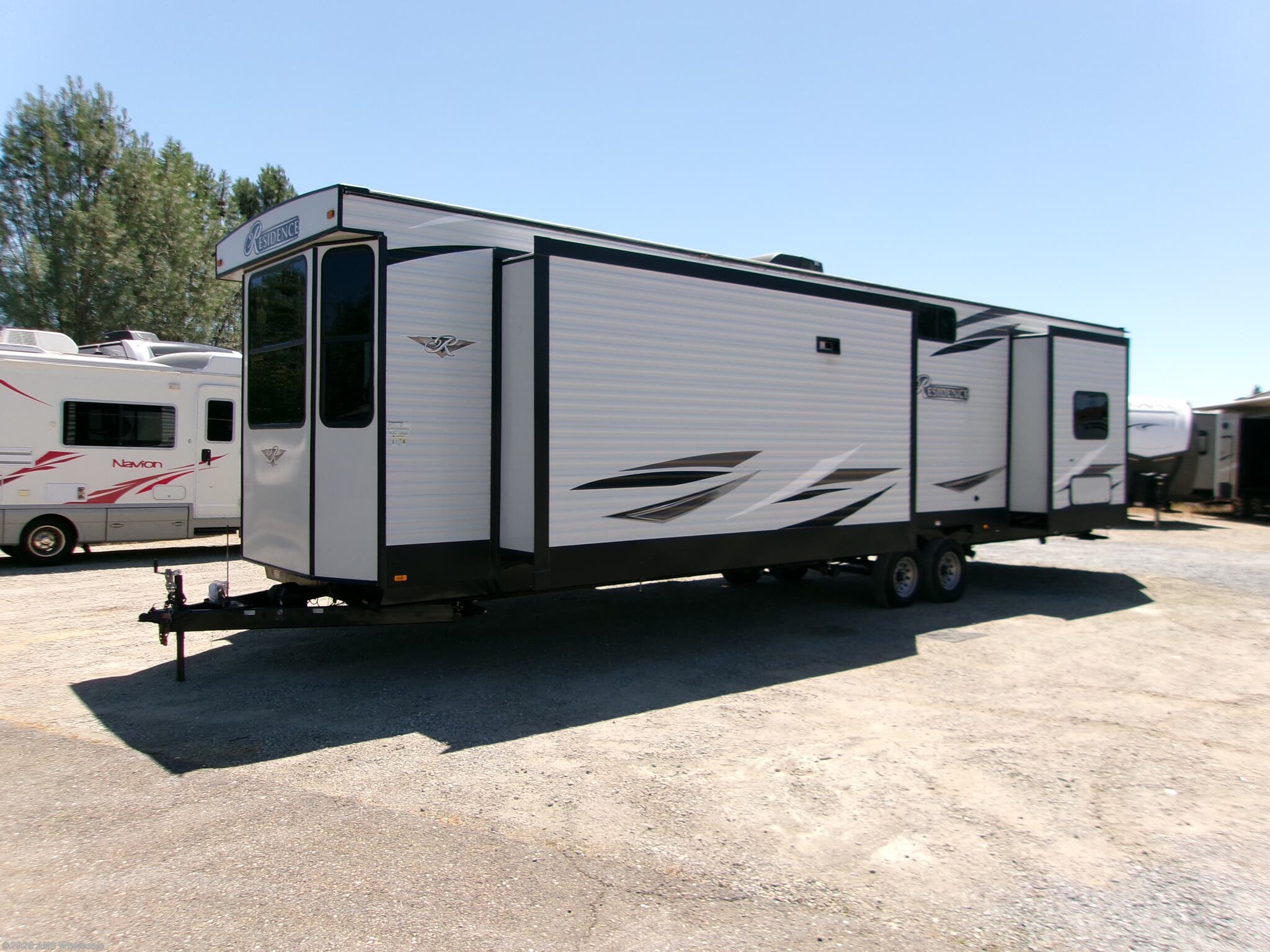 2021 Keystone Residence 40MKTS - Used Destination Trailer For Sale by AMS Wholesale in Placerville, California features Hitch, Washer/Dryer Prep, Furnace, Shower, Ceiling Fan